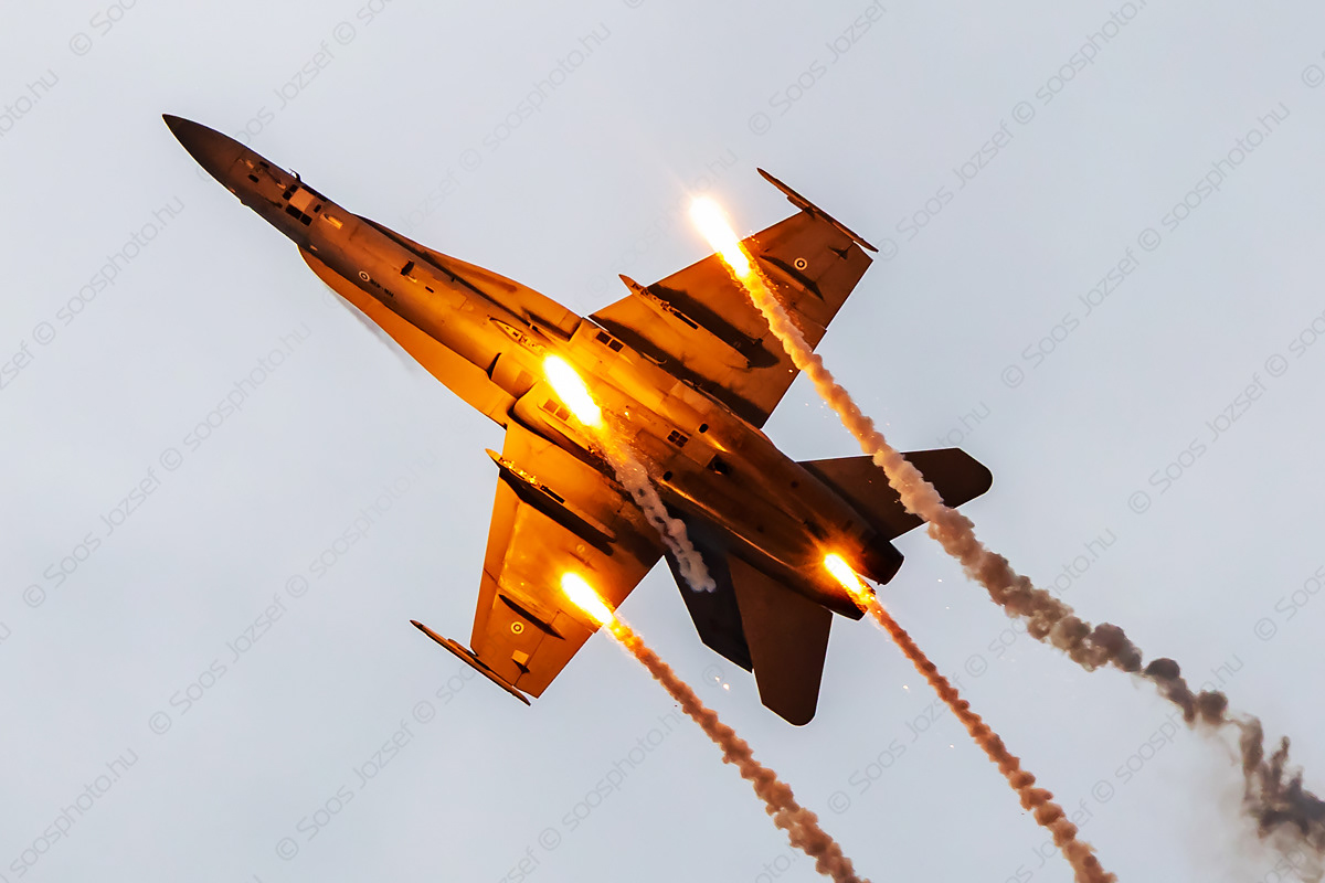 Finnish Air Force F-18C fighter jet dispensing flares