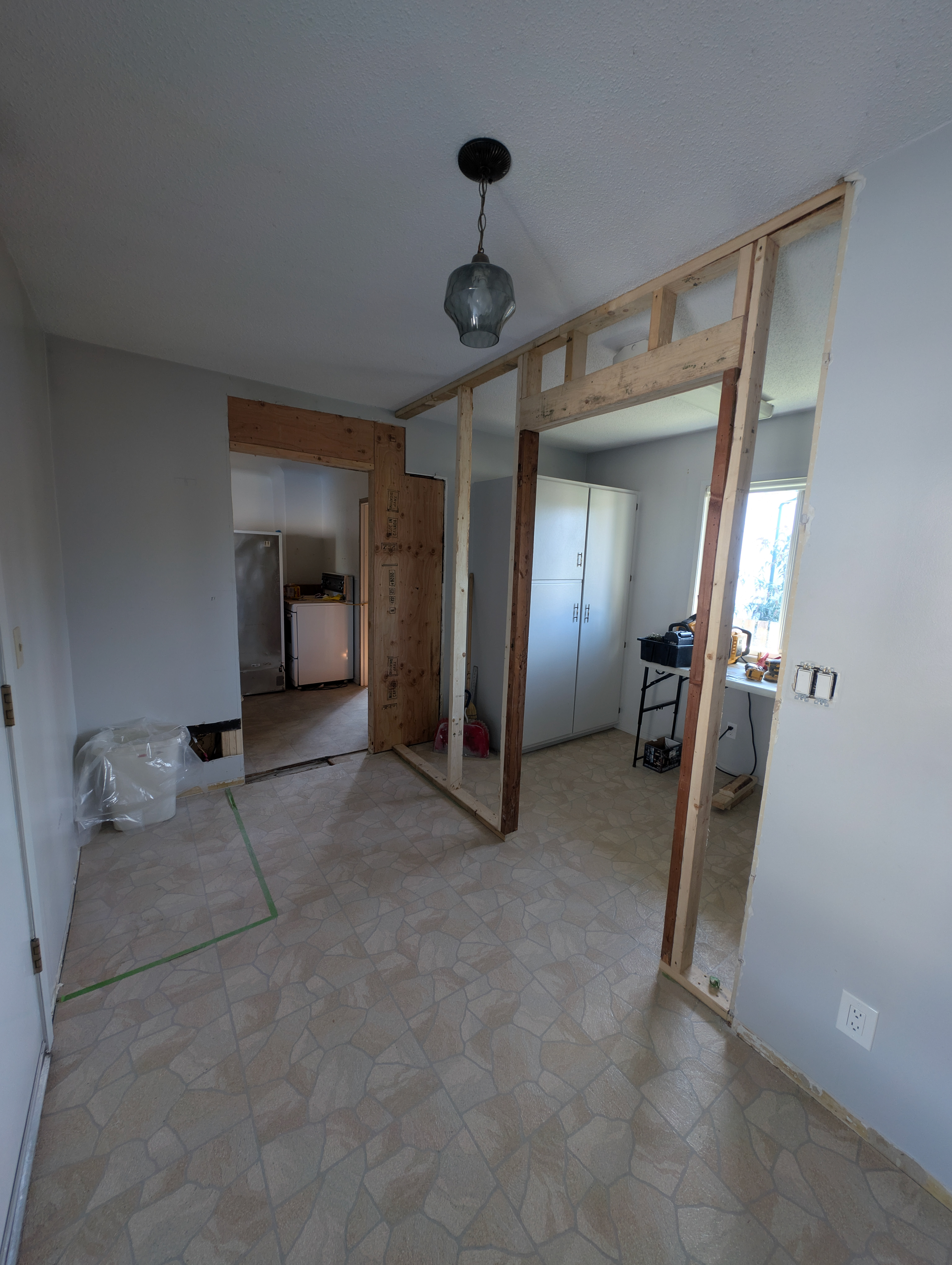 New wall framed to enclose laundry