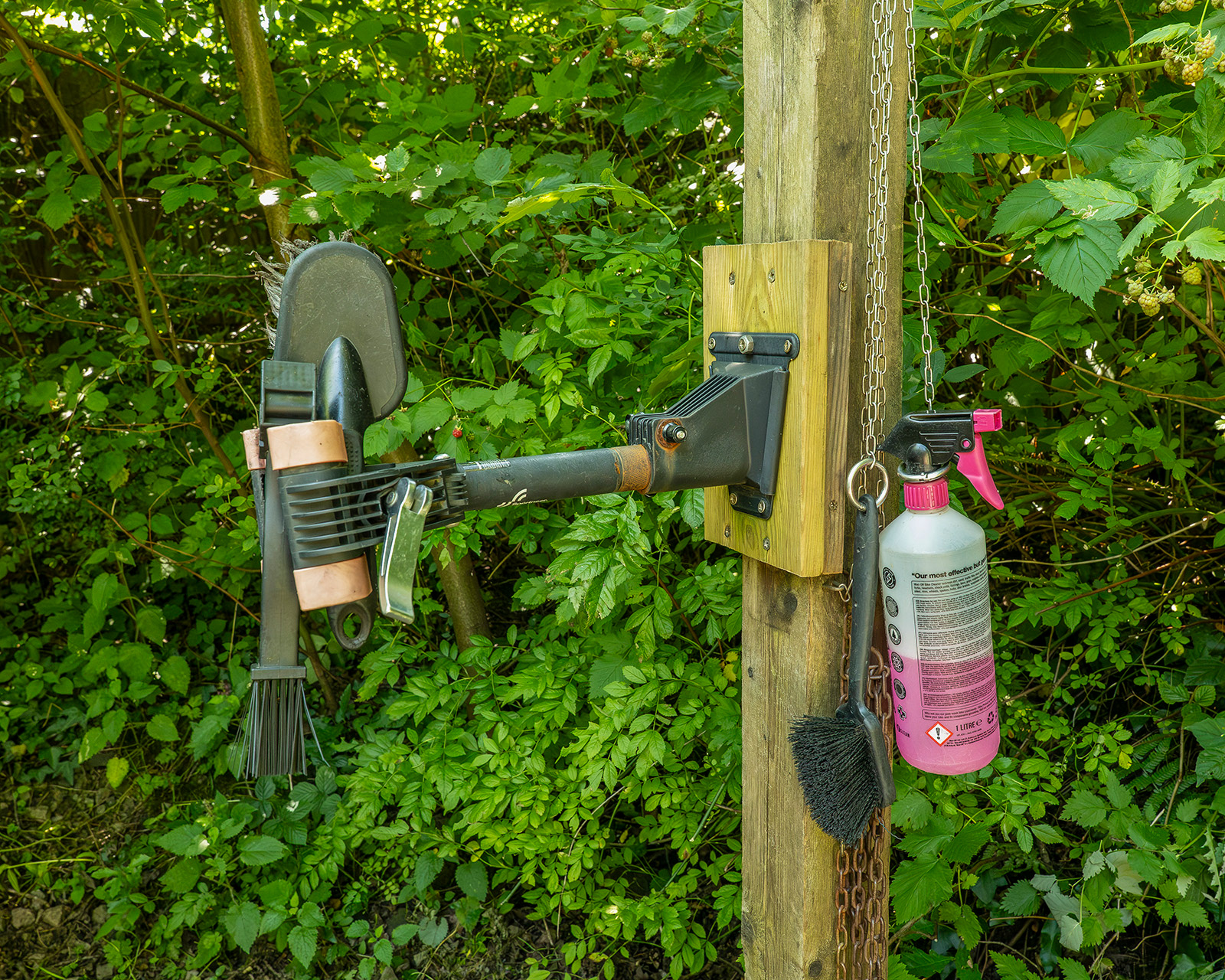 A close-up of the bike washing area at Roost Merthyr Tydfil, providing practical facilities for guests to clean their bikes after exploring the South Wales countryside.