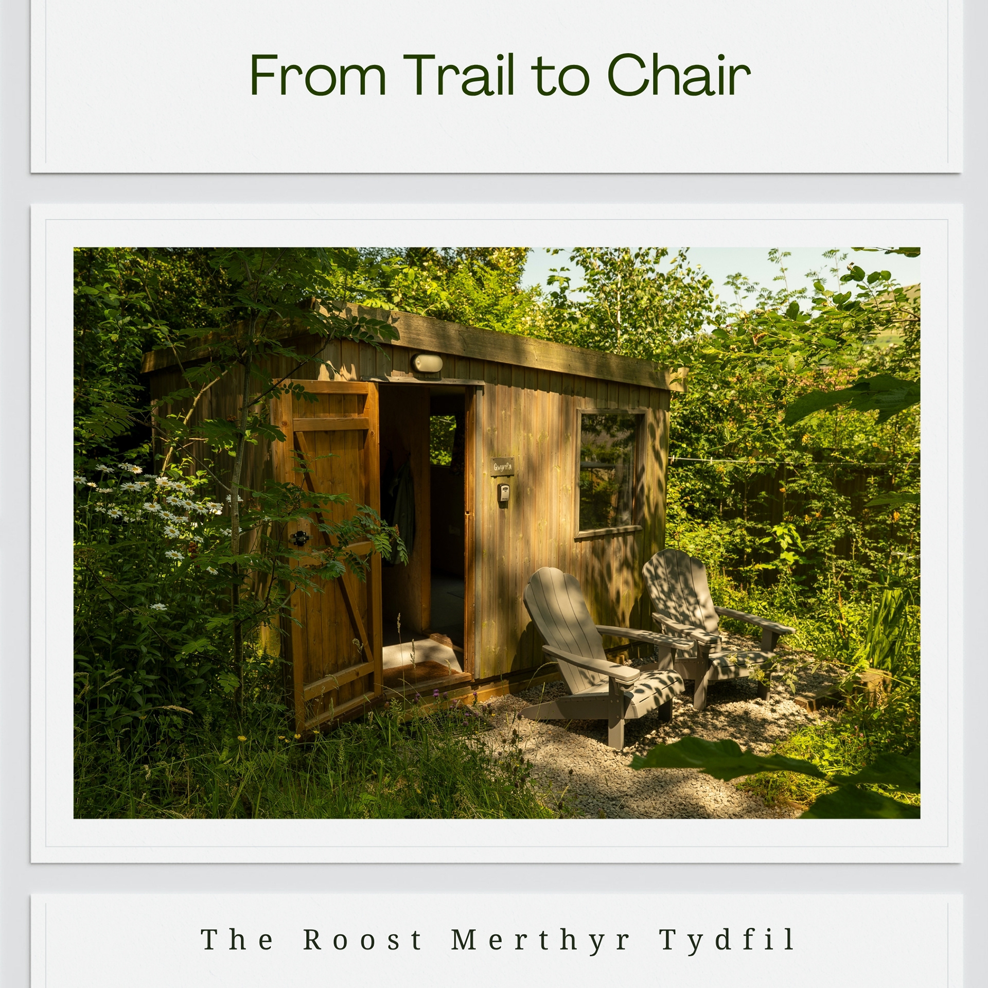 From Trail to Chair: Gwynfa cabin at Roost Merthyr Tydfil, with two wooden chairs nestled in the dappled shade, offering a quiet place to relax after exploring the South Wales countryside.