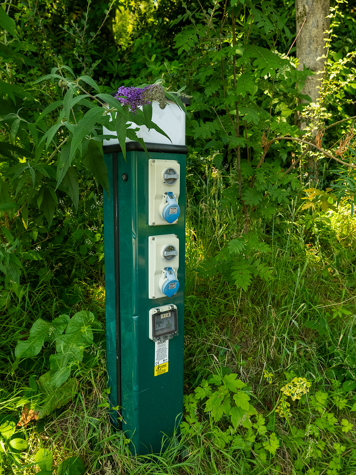An electric charging point for campervans at Roost Merthyr Tydfil, providing a practical facility for guests travelling through South Wales by campervan.