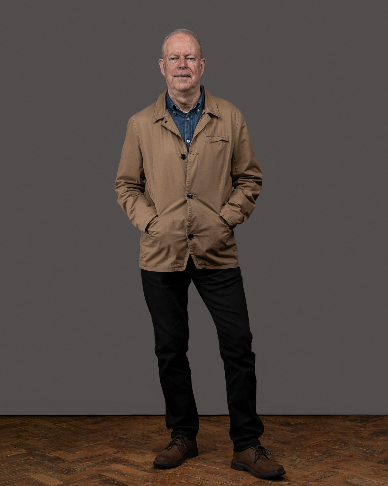 Full-length, standing, neutral backdrop