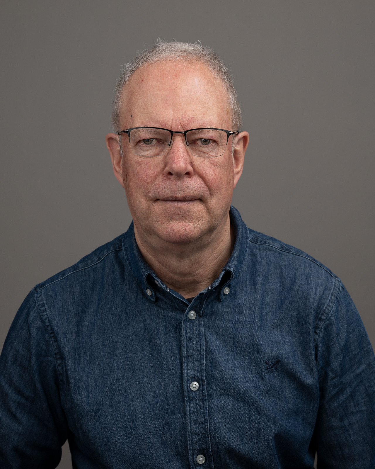 Head and shoulders, grey backdrop