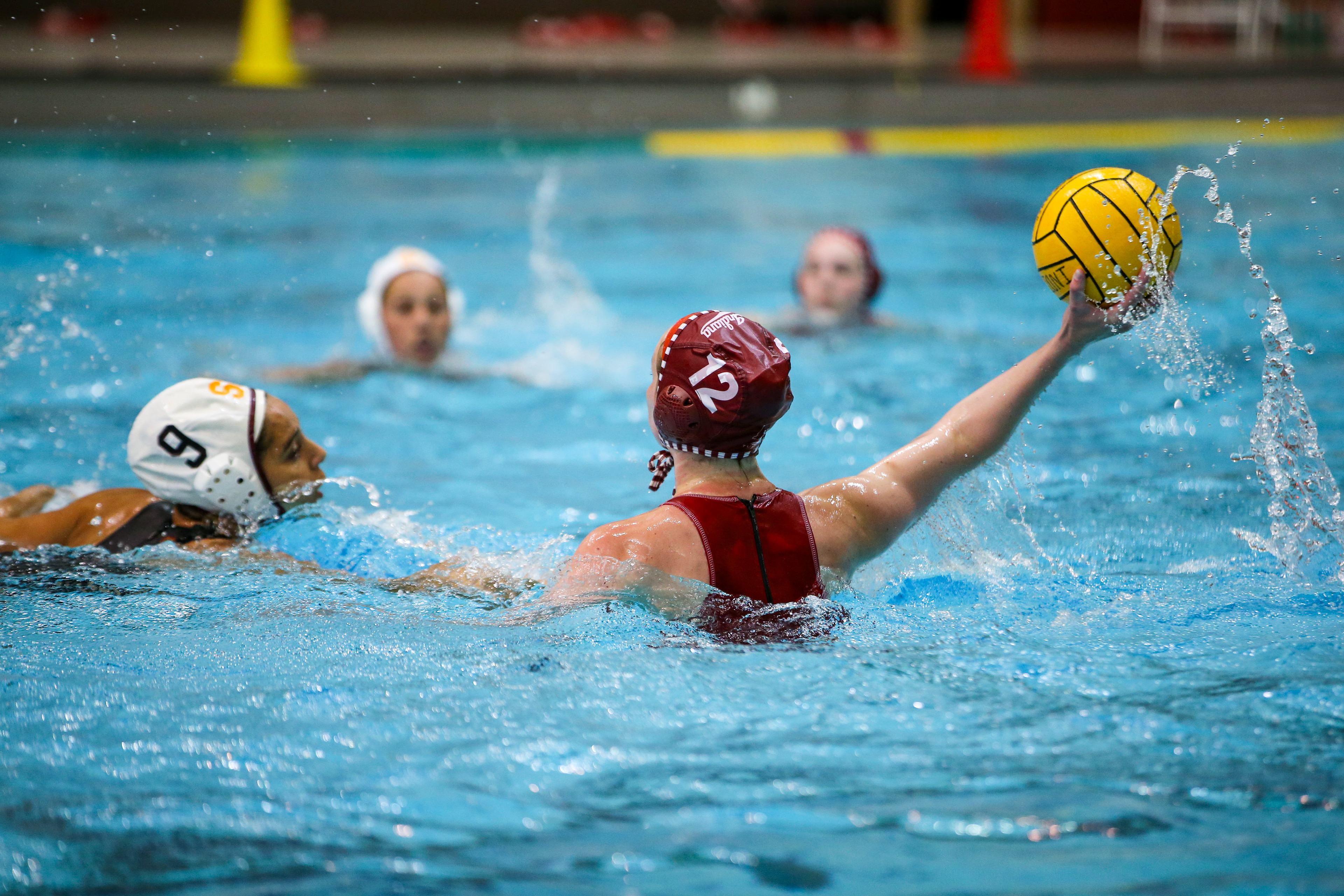 BLOOMINGTON, IN - April 02, 2021 - attacker Tina Doherty #12 of the Indiana Hoosiers during the game against the Southern California Trojans and the Indiana Hoosiers at Counsilman-Billingsley Aquatic Center in Bloomington, IN.