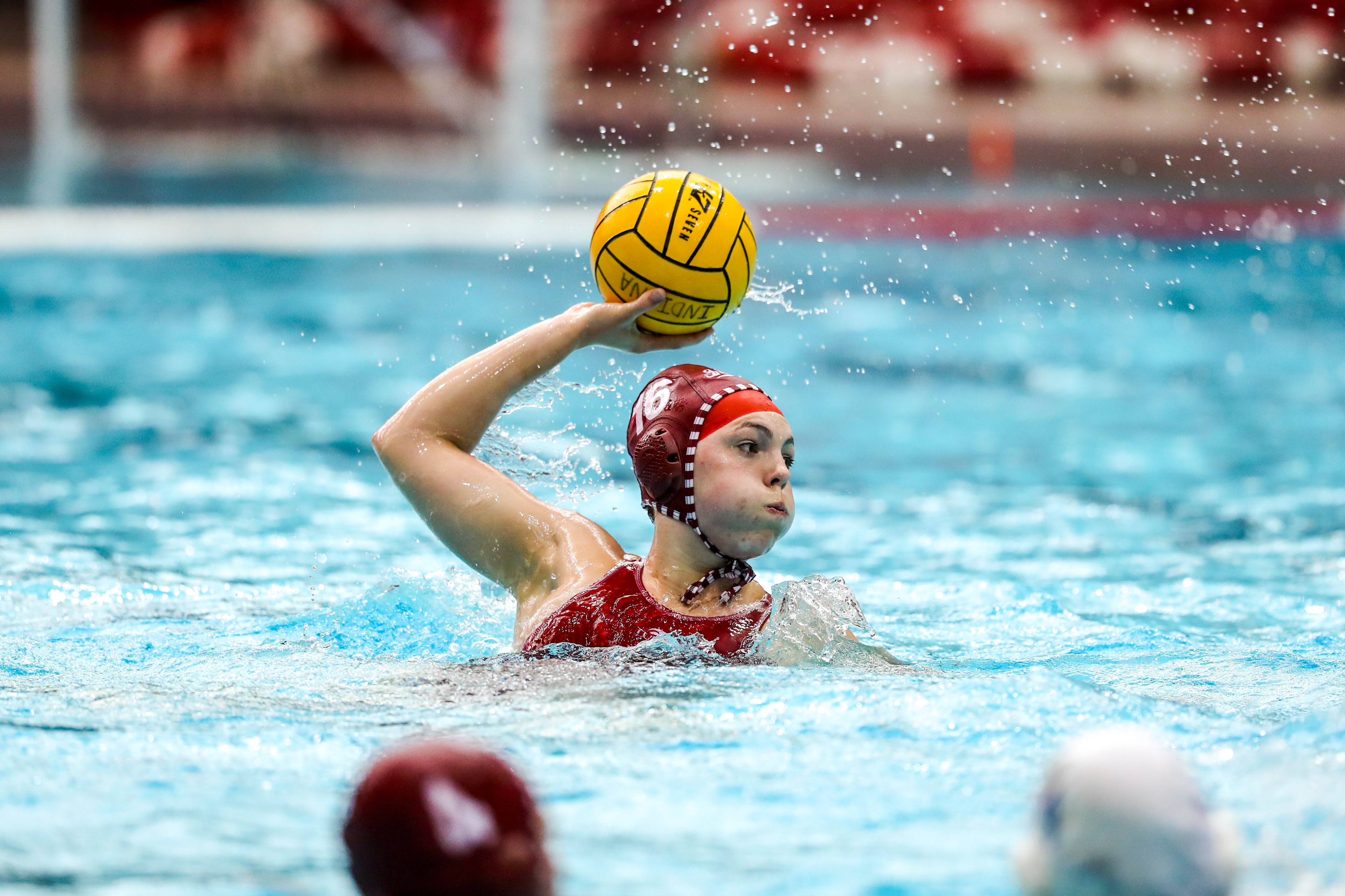 BLOOMINGTON, IN - April 13, 2021 - driver Kallie White #16 of the Indiana Hoosiers during the game against the UCLA Bruins and the Indiana Hoosiers at Counsilman-Billingsley Aquatic Center in Bloomington, IN. 