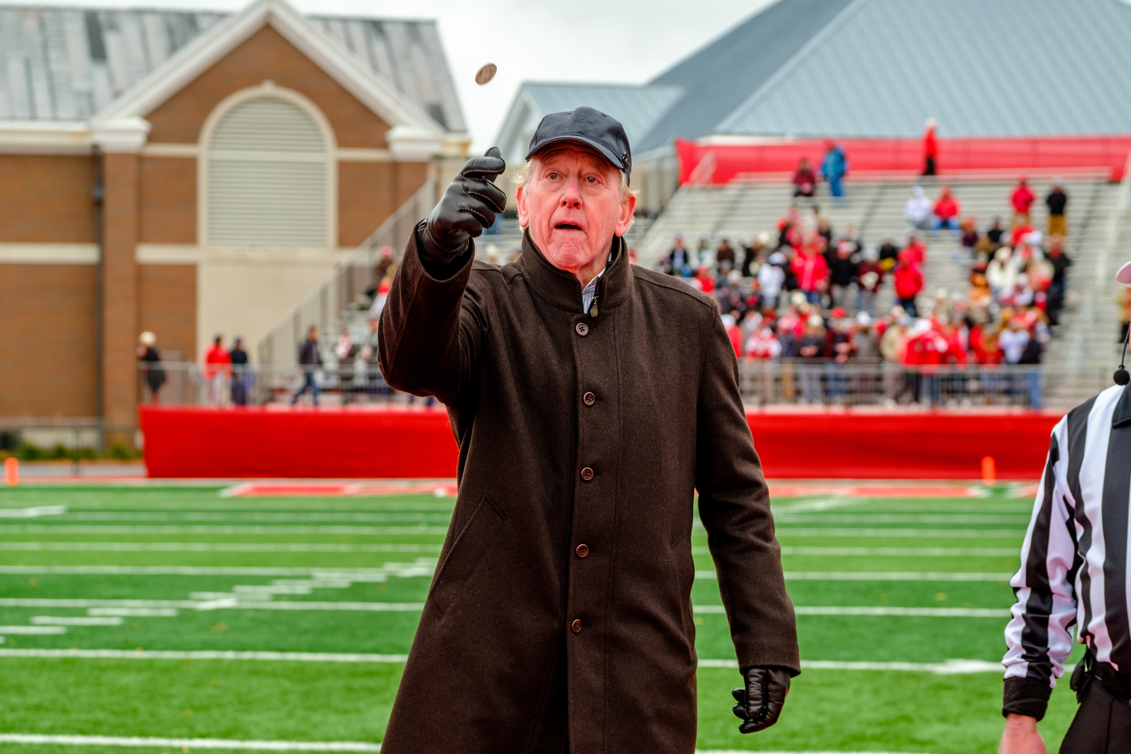 CRAWFORDSVILLE, IN – November 13, 2021 – Archie Manning flips the game coin before the game against the DePauw Tigers and the Wabash Little Giants at Little Giant Stadium in Crawfordsville, IN. 