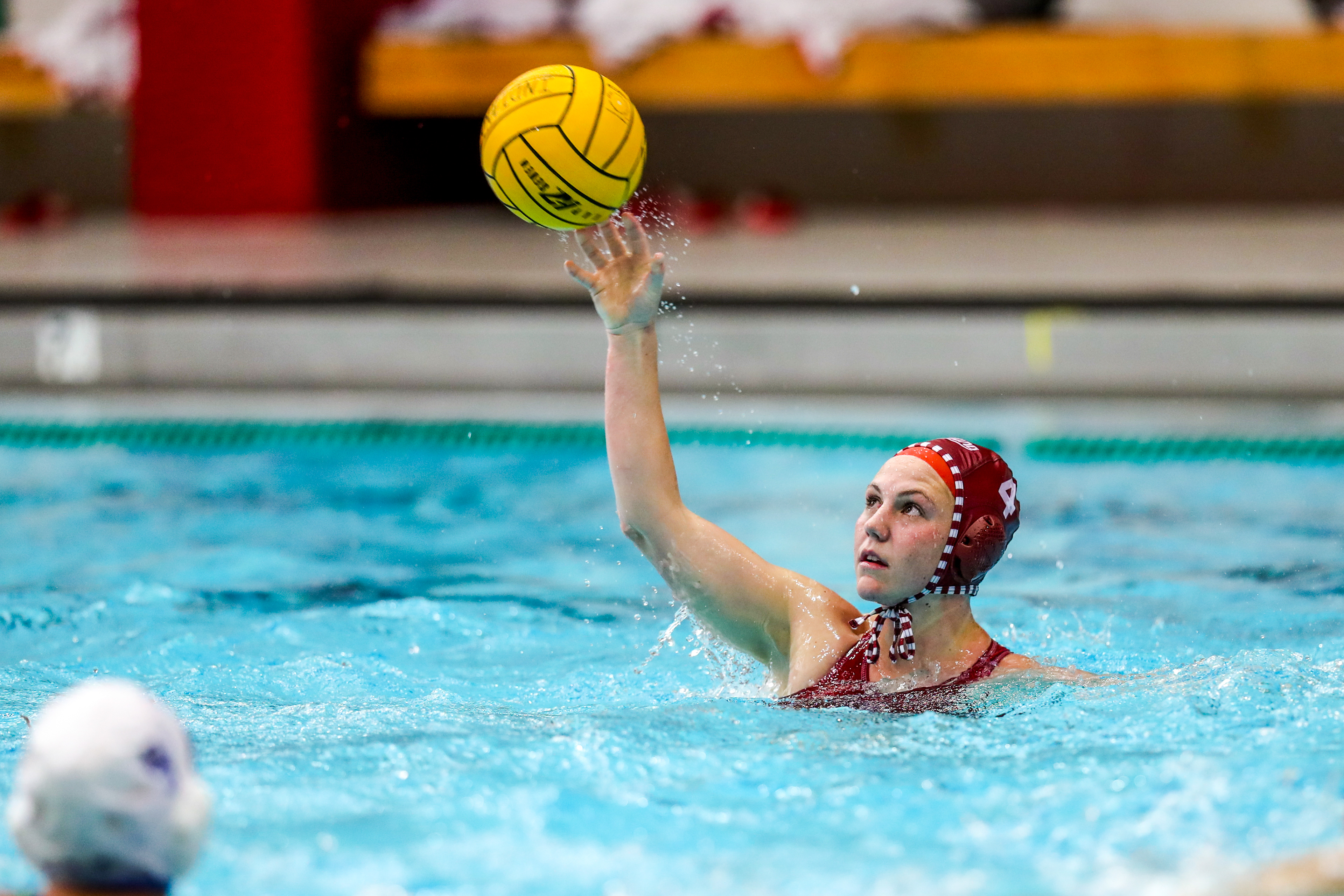 BLOOMINGTON, IN - April 13, 2021 - utility Zoe Crouch #4 of the Indiana Hoosiers during the game against the UCLA Bruins and the Indiana Hoosiers at Counsilman-Billingsley Aquatic Center in Bloomington, IN. 