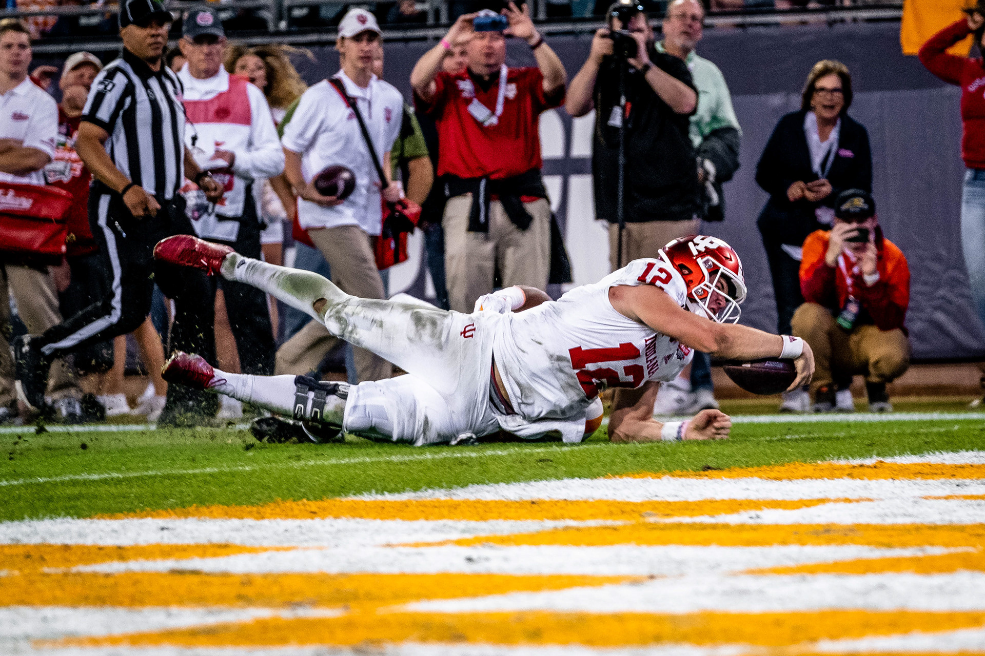 JACKSONVILLE, FL – 01.02.2020 – Quarterback Peyton Ramsey #12 of the Indiana Hoosiers is just short of the end zone during the TaxSlayer Gator Bowl against the Tennessee Volunteers and the Indiana Hoosiers at Everbank Stadium Stadium in Jacksonville, FL. 