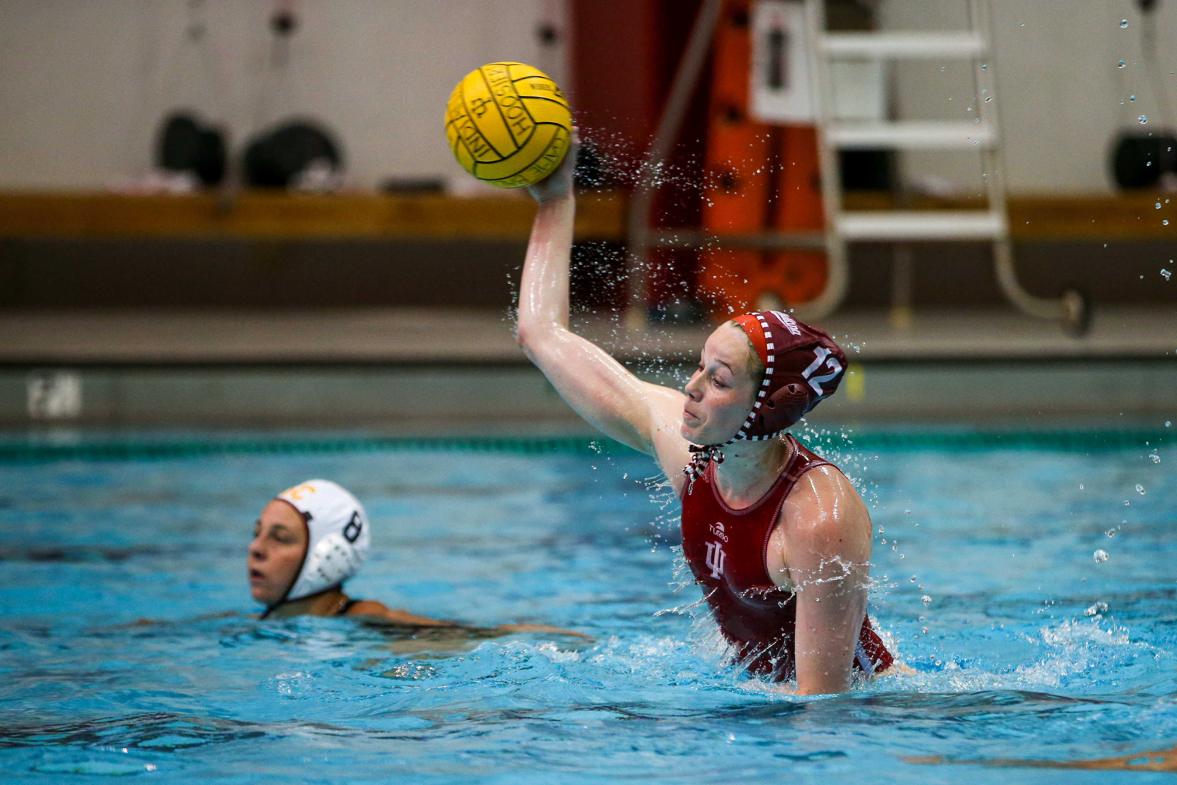 BLOOMINGTON, IN - April 02, 2021 - attacker Tina Doherty #12 of the Indiana Hoosiers during the game against the Southern California Trojans and the Indiana Hoosiers at Counsilman-Billingsley Aquatic Center in Bloomington, IN.