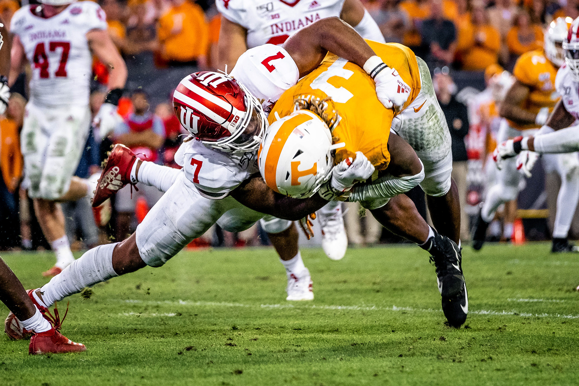 JACKSONVILLE, FL – 01.02.2020 – Linebacker Reakwon Jones #7 of the Indiana Hoosiers tackles a Tennessee Volunteer during the TaxSlayer Gator Bowl against the Tennessee Volunteers and the Indiana Hoosiers at Everbank Stadium Stadium in Jacksonville, FL. 