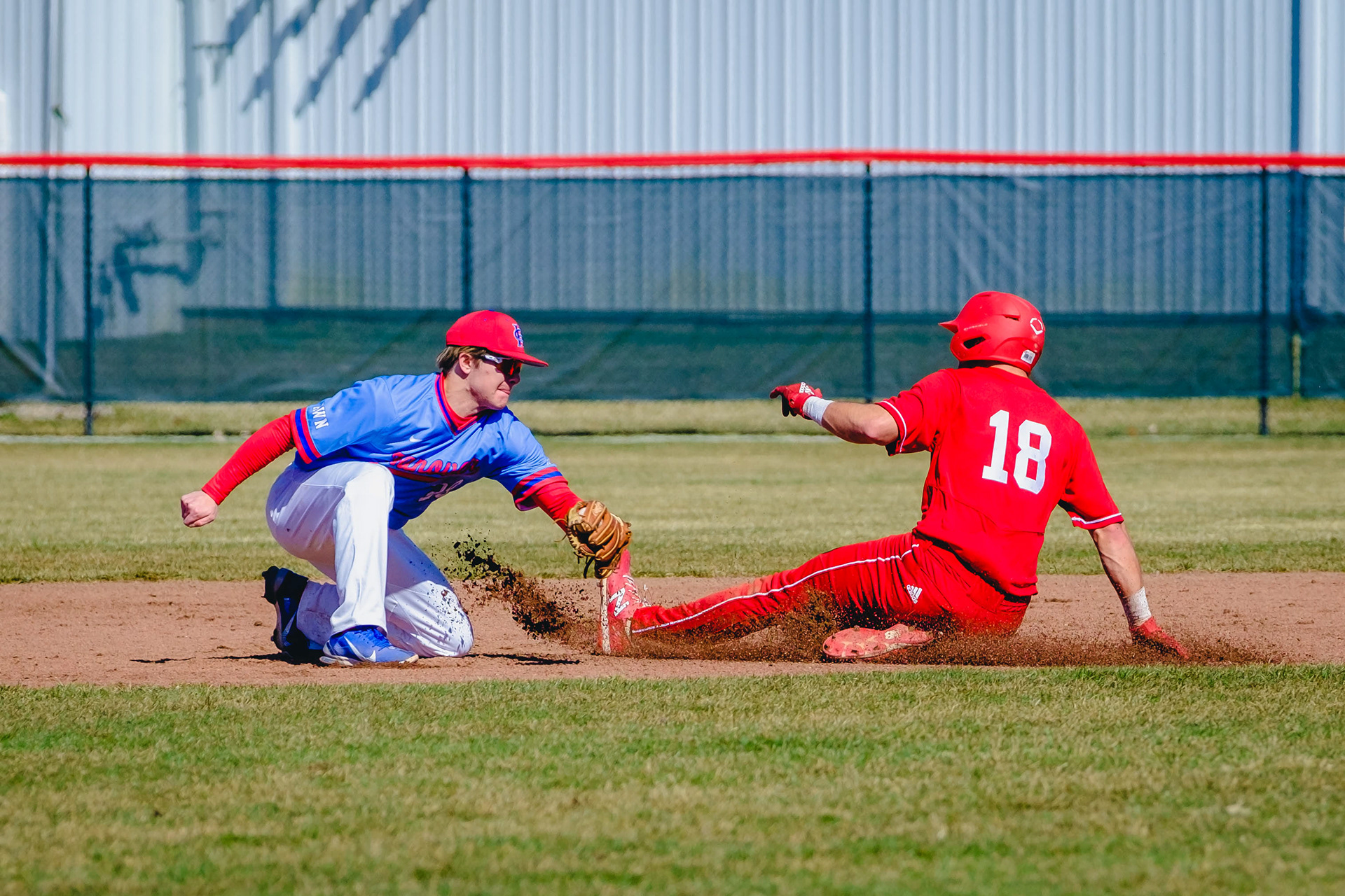 CRAWFORDSVILLE, IN - March 20, 2022 - Outfielder Camden Scheidt #18 of the Wabash Little Giants during the game between the Hanover Panthers and the Wabash Little Giants at the Goodrich Ballpark in Crawfordsville, IN.