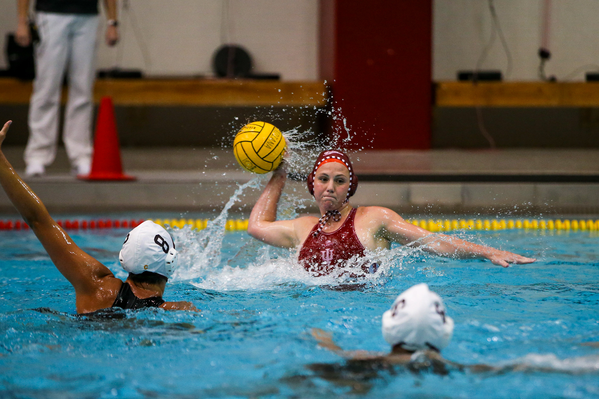 BLOOMINGTON, IN - April 02, 2021 - utility Zoe Crouch #4 of the Indiana Hoosiers during the game against the Southern California Trojans and the Indiana Hoosiers at Counsilman-Billingsley Aquatic Center in Bloomington, IN. 