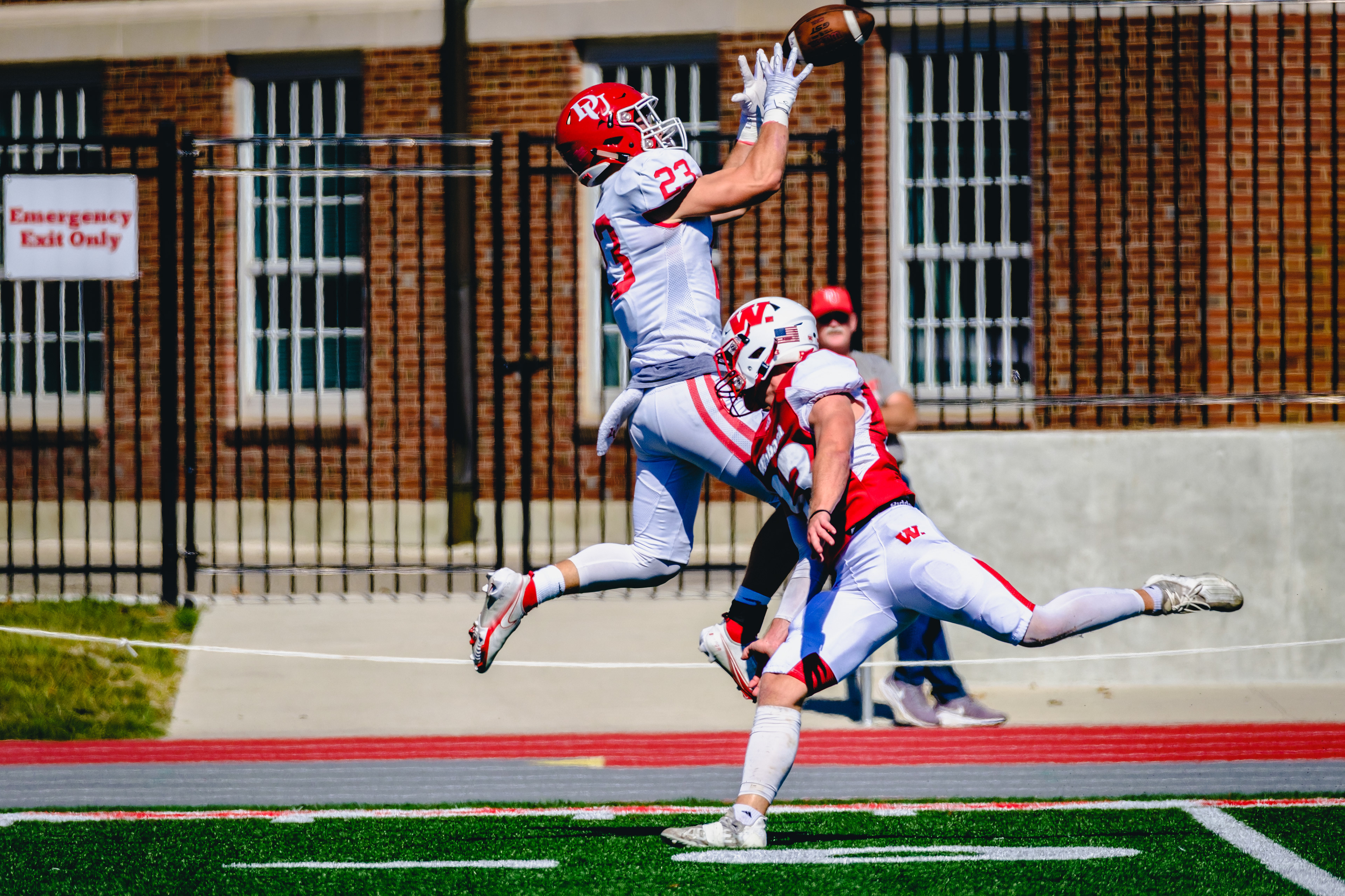 CRAWFORDSVILLE, IN – September 24, 2022 – Tight End Jon Adamson #23 of the Denison Big Red catches the ball during the game against the Denison Big Red and the Wabash Little Giants at Little Giant Stadium in Crawfordsville, IN.