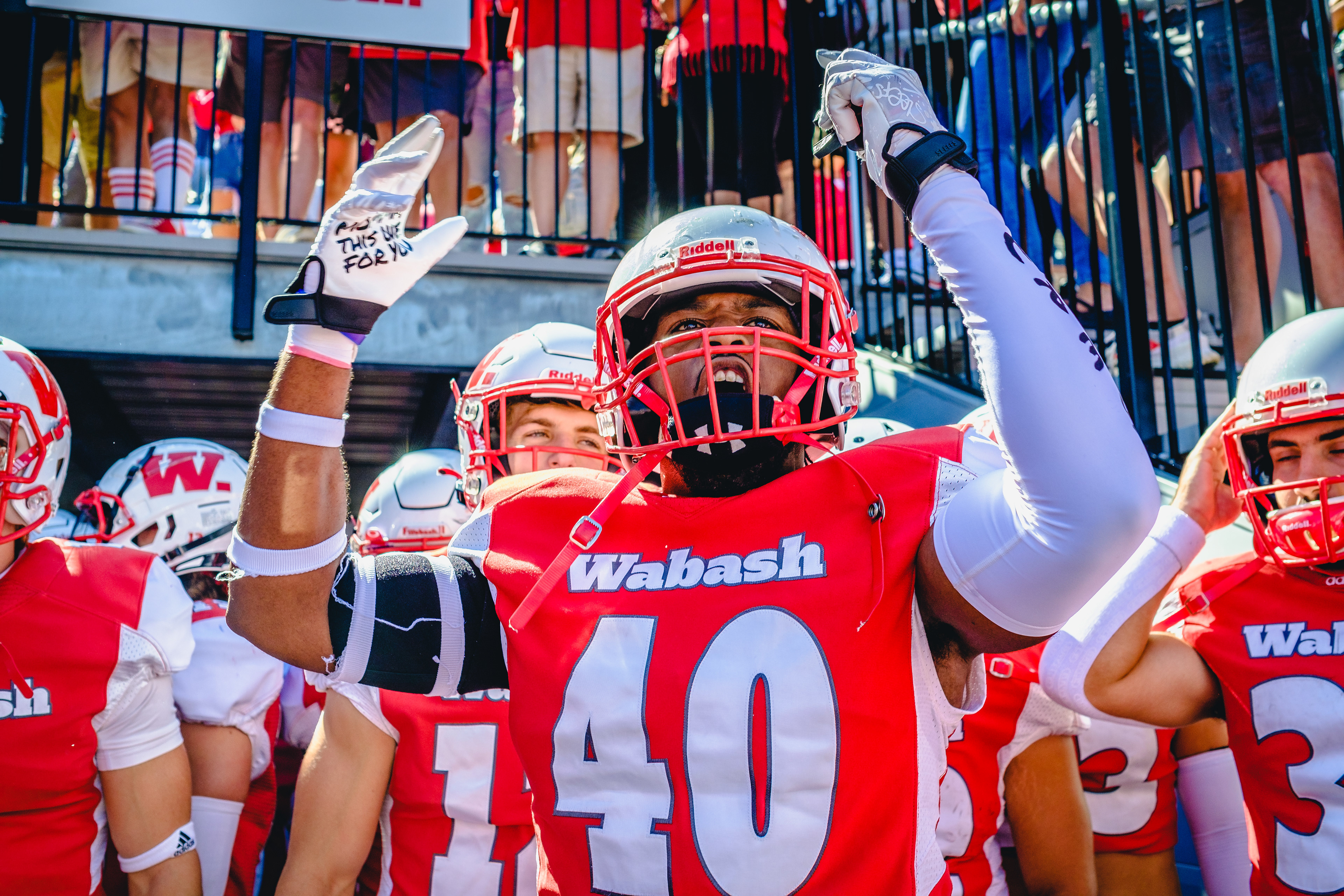 CRAWFORDSVILLE, IN – September 24, 2022 – Defensive End Jamari Washington #40 of the Wabash Little Giants cheer before the game against the Denison Big Red and the Wabash Little Giants at Little Giant Stadium in Crawfordsville, IN. 