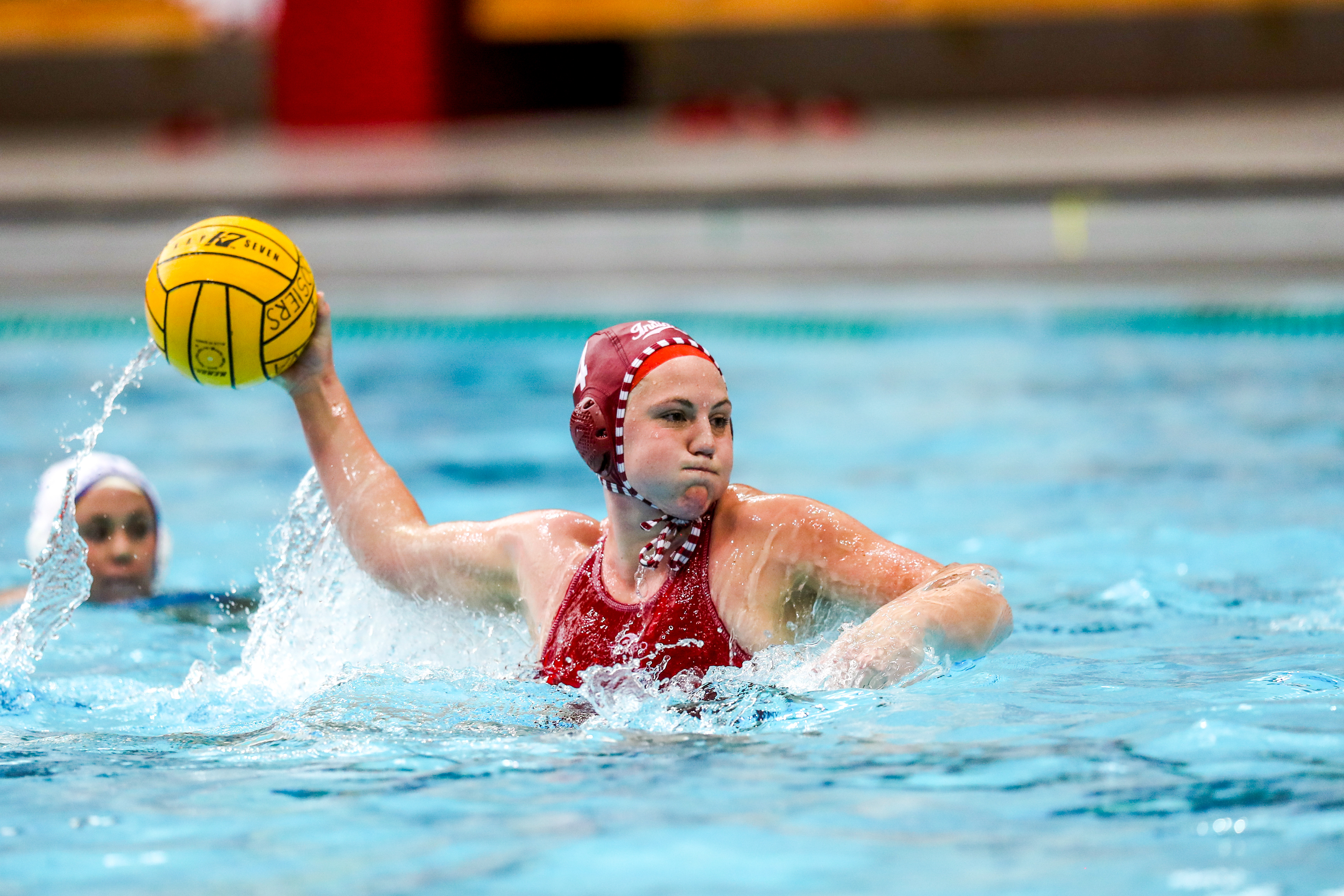 BLOOMINGTON, IN - April 13, 2021 - utility Zoe Crouch #4 of the Indiana Hoosiers during the game against the UCLA Bruins and the Indiana Hoosiers at Counsilman-Billingsley Aquatic Center in Bloomington, IN. 