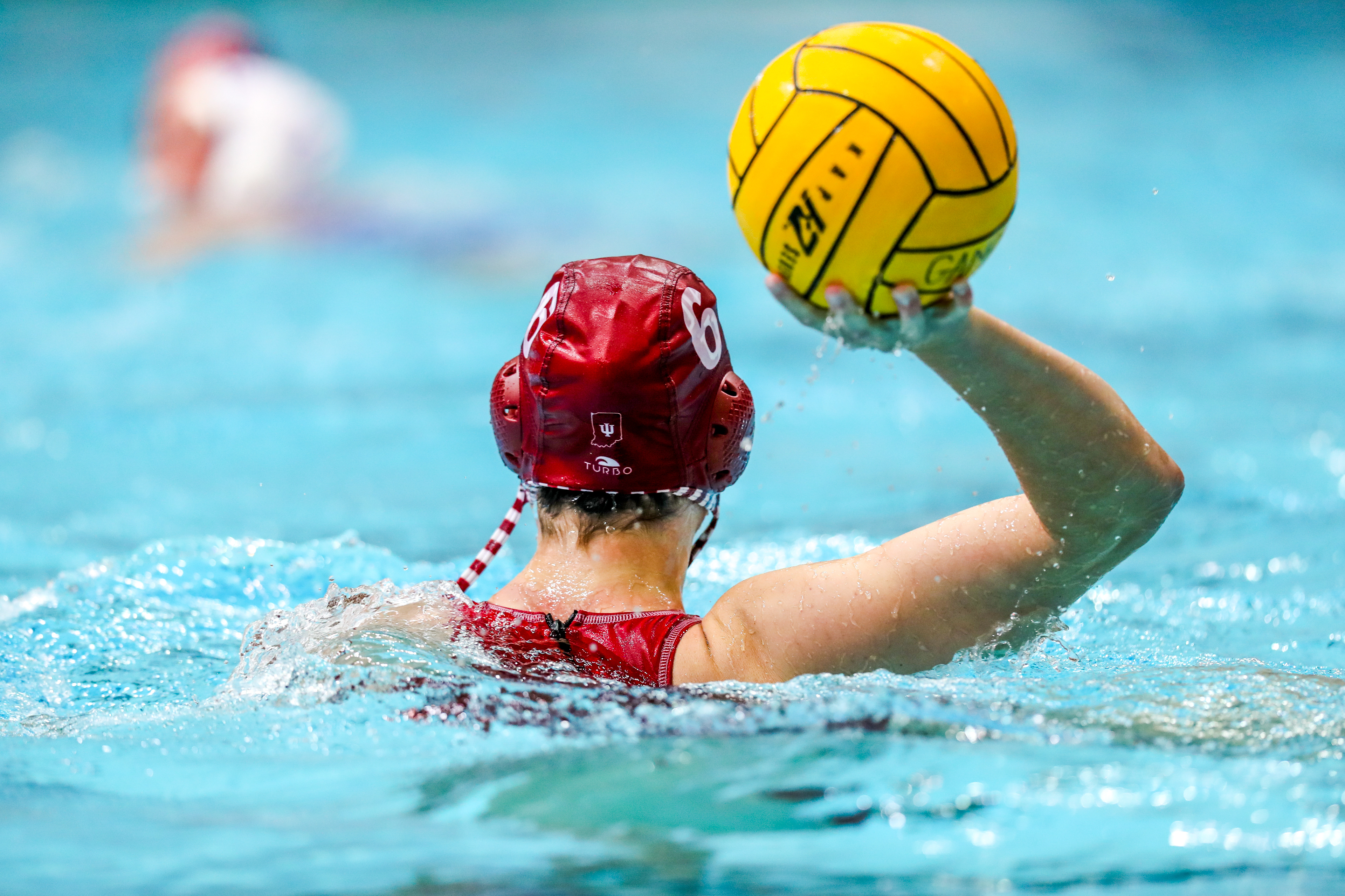 BLOOMINGTON, IN - April 13, 2021 - attacker Lanna Debow #6 of the Indiana Hoosiers during the game against the UCLA Bruins and the Indiana Hoosiers at Counsilman-Billingsley Aquatic Center in Bloomington, IN. 