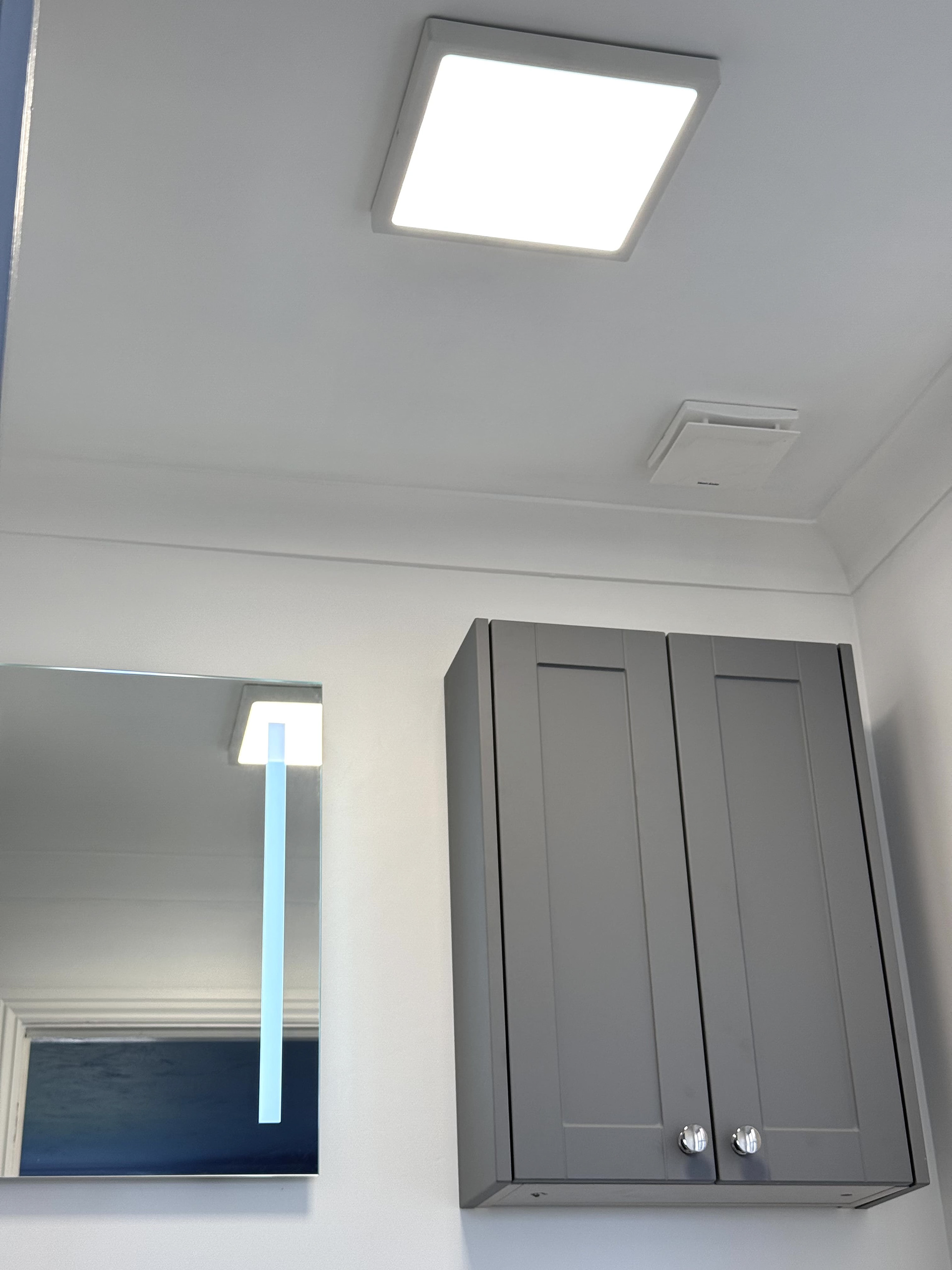 IP44 Bathroom installation, with Illuminated mirror, overhead light and a silent extractor fan fitted for a customer in Bracklesham