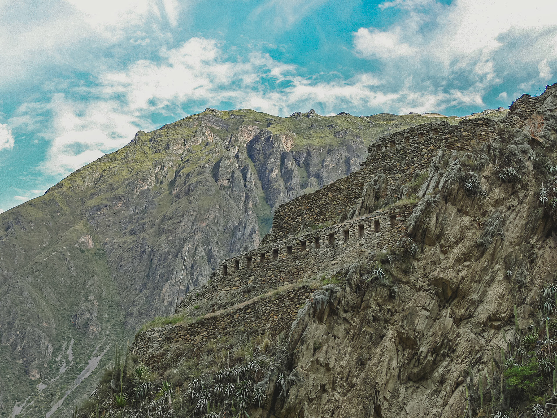 Before the time of GPS one trick in war was to perfectly camouflage buildings like this old Inca fortress close to the famous Machu Picchu.  You need to look very close to find it hidden in the mountains  :-)