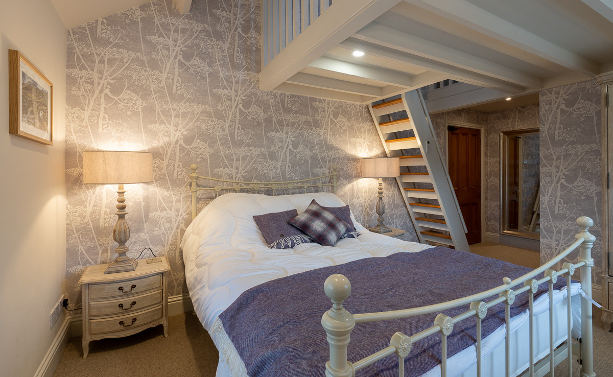 The king-size master bedroom