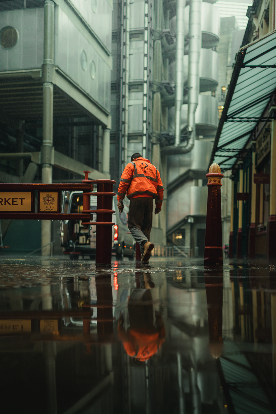 Street Photography in Leadenhall Market with the Lloyds building in the background