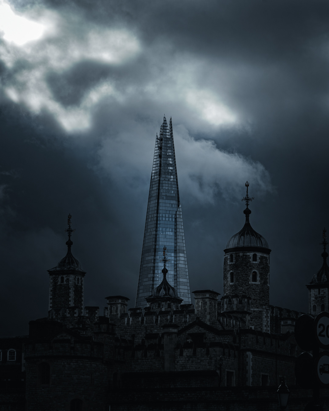 Where history meets modernity—London’s Shard skyline under a dramatic sky.