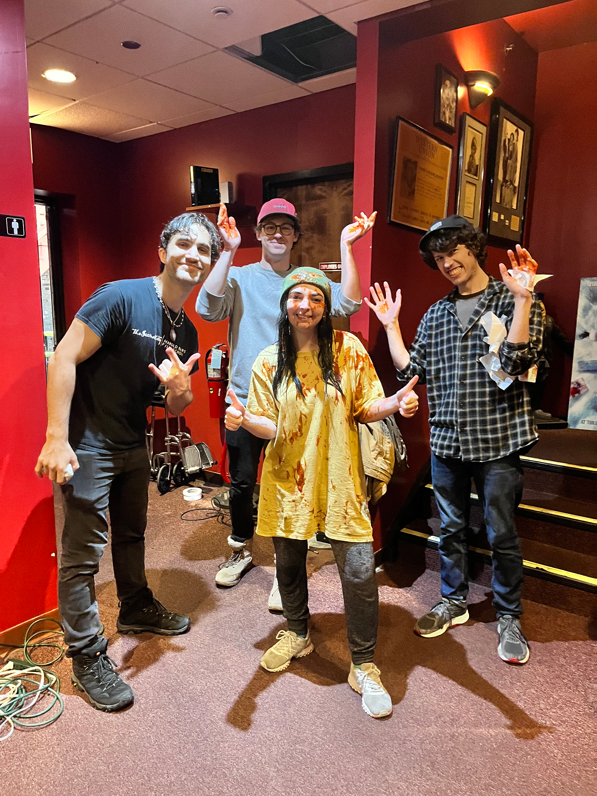Behind the scenes photo of Sam Casey, Riley James, Claire Sundbye, and Josh Leftwich on the set of "Laughing Since '79" commercial advertisement for The Laugh Factory