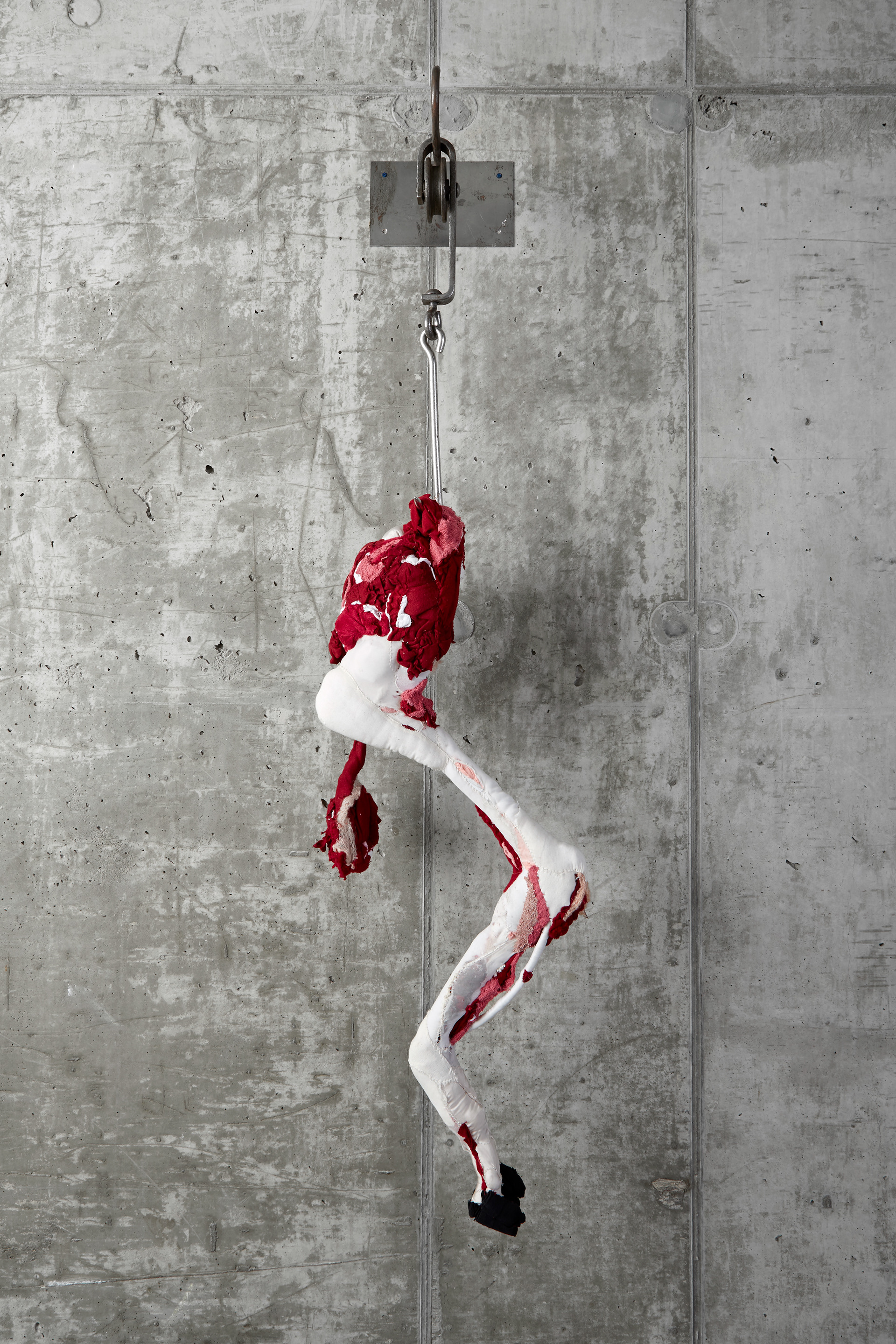 "Roadkill" 2011 | Discarded Clothing, Metal Hooks | 62 x 17 x 19 in.