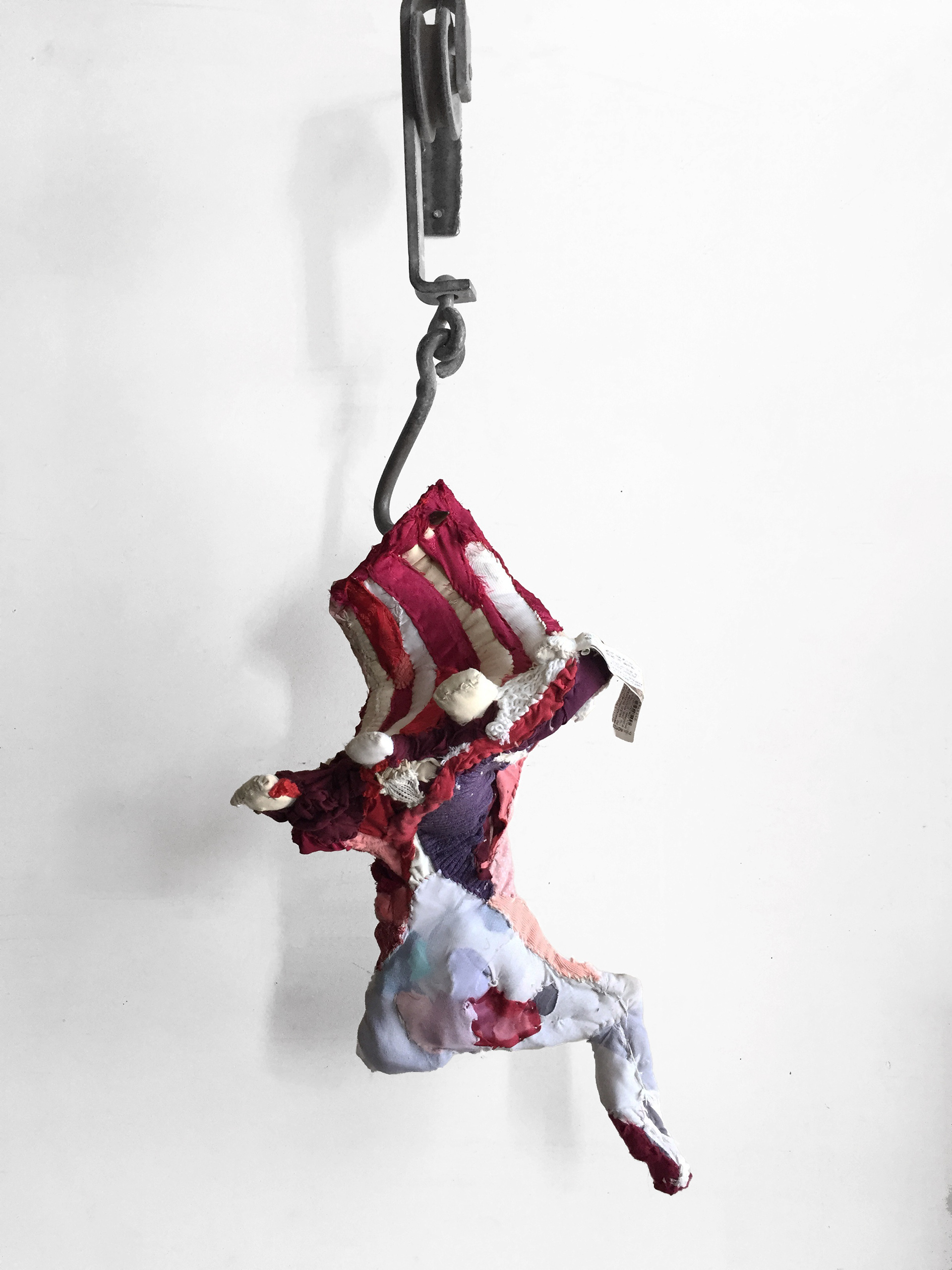 "Widowed Carcass" 2016 (Detail) | Discarded Clothing, Meat Hooks | 44 x 28 x 18 in.