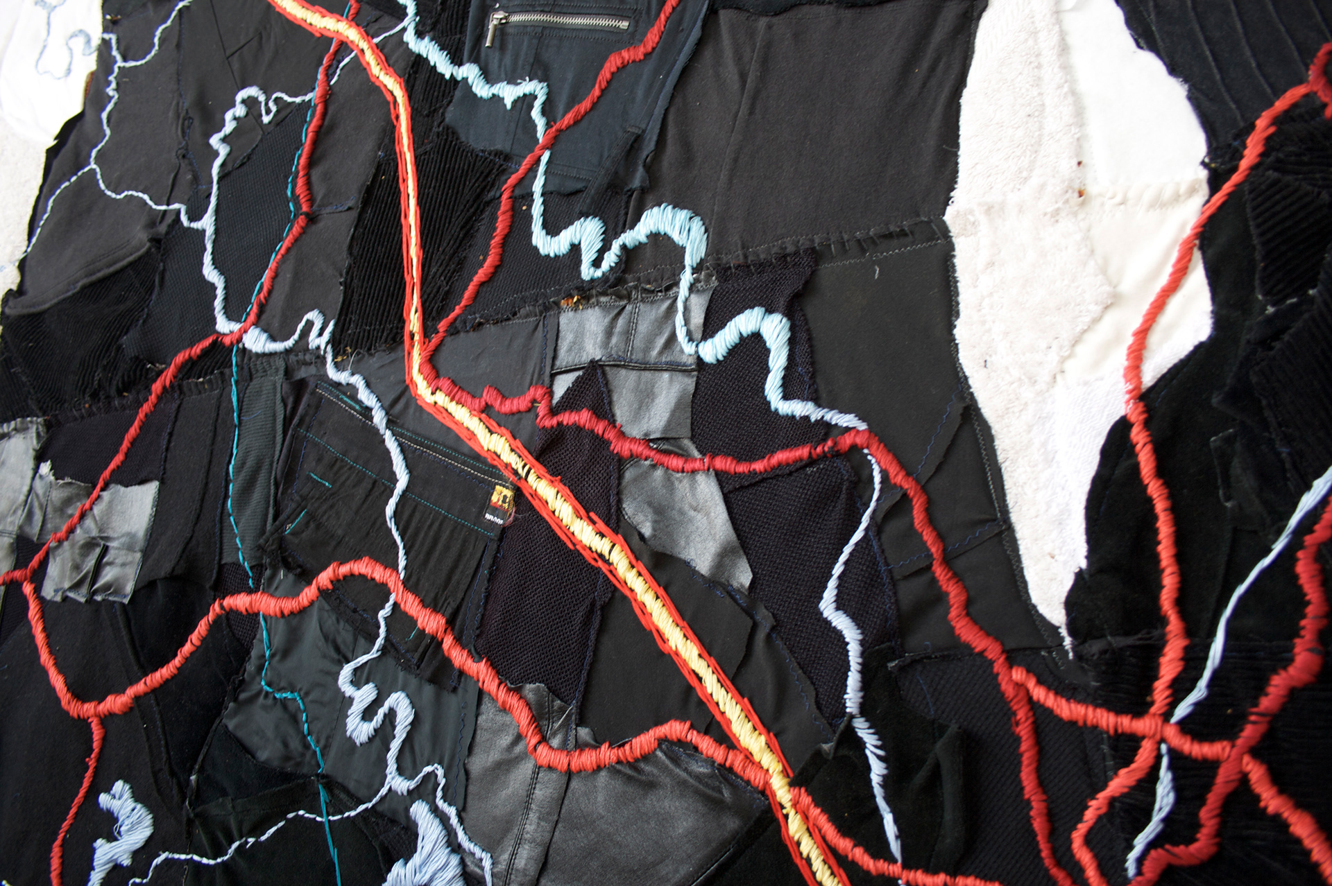 "Map of Truth" 2008 (Detail) | Discarded Clothing belonging to the Artist, Wood, Embroidery Floss | 132 x 93 in.
