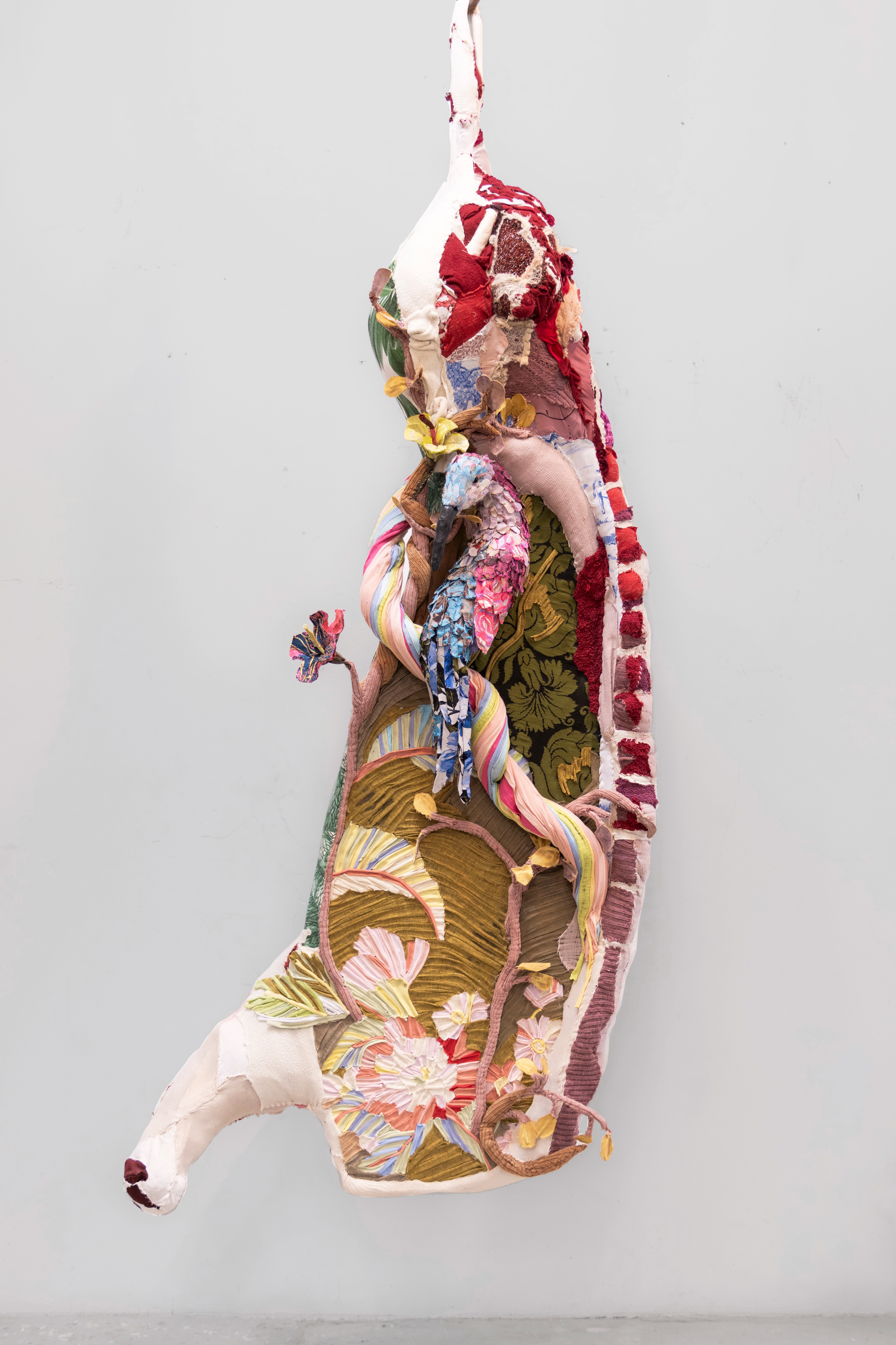 "Summers to Come"  2024 | Discarded textiles | 93 x 29 x 19 in.