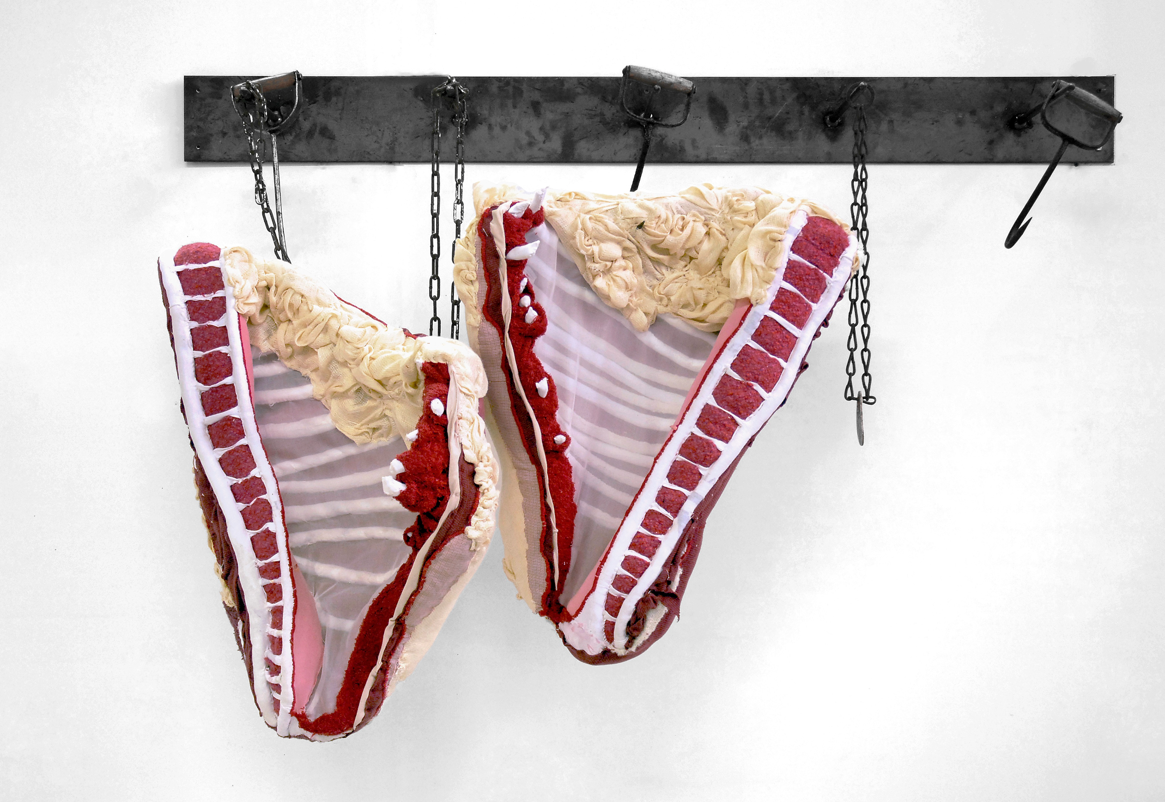 "Bound" 2008 | Discarded Clothing, Metal Hooks, Chains | 61 x 39 x 15 in.