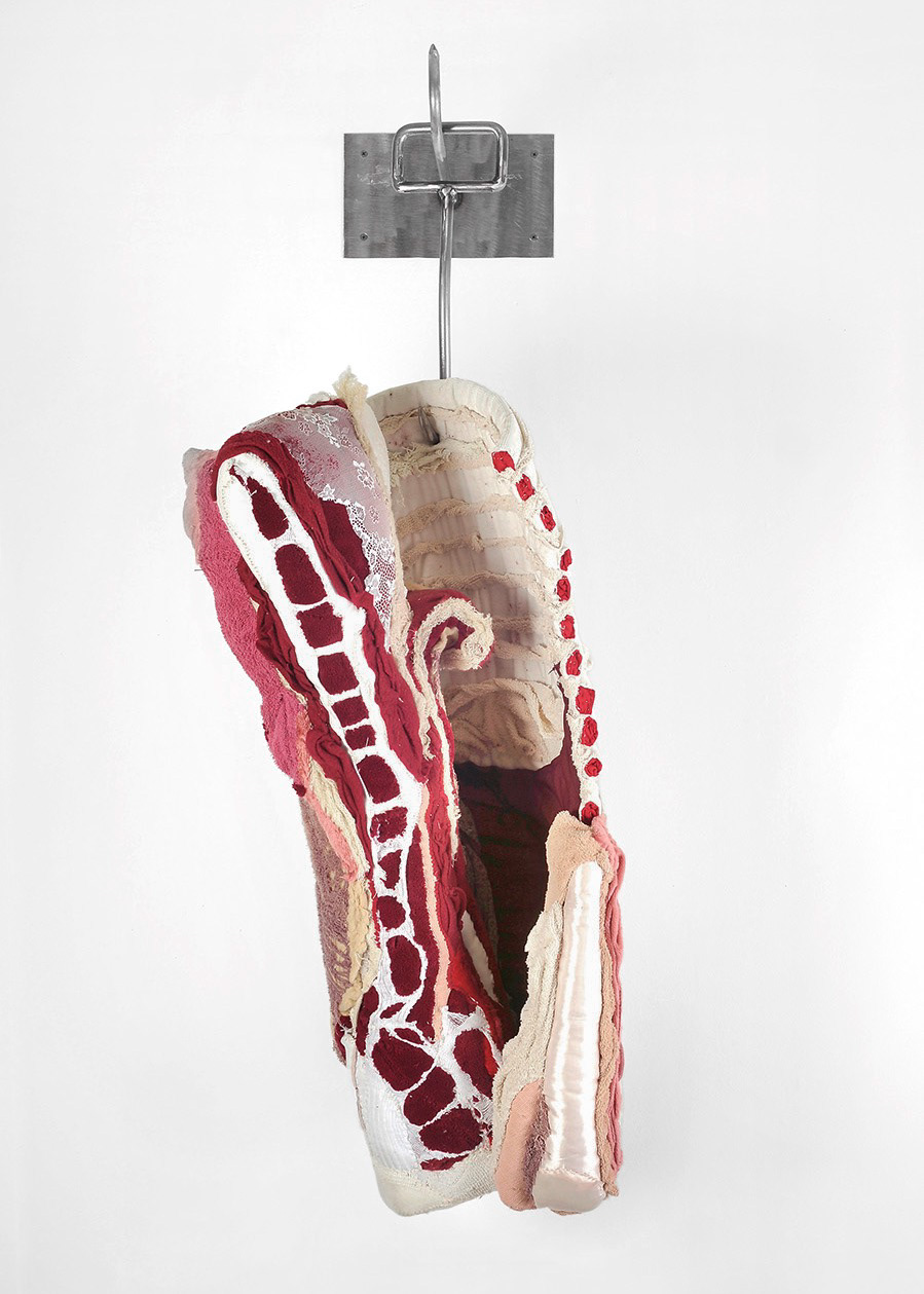 "Intertwined" 2010 | Discarded Clothing, Metal Hooks | 47 x 19 x 13 in.