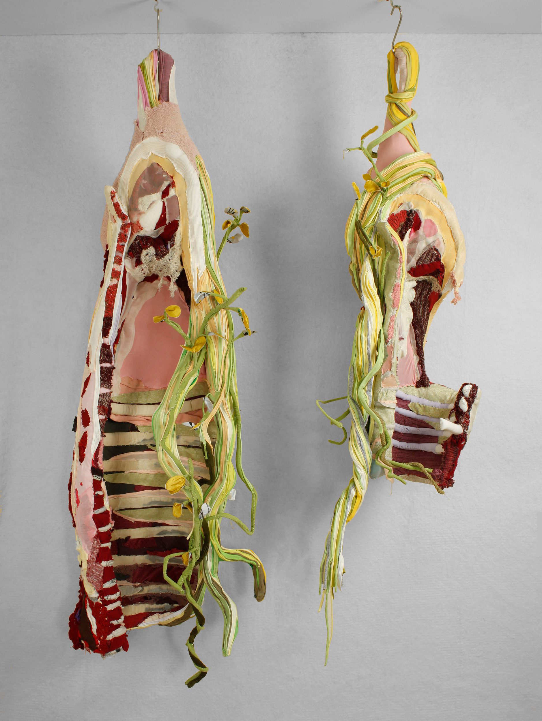 "Heal the World" 2021 | Discarded clothing, metal chains, meat hooks | 63 x 24 x 22 in.