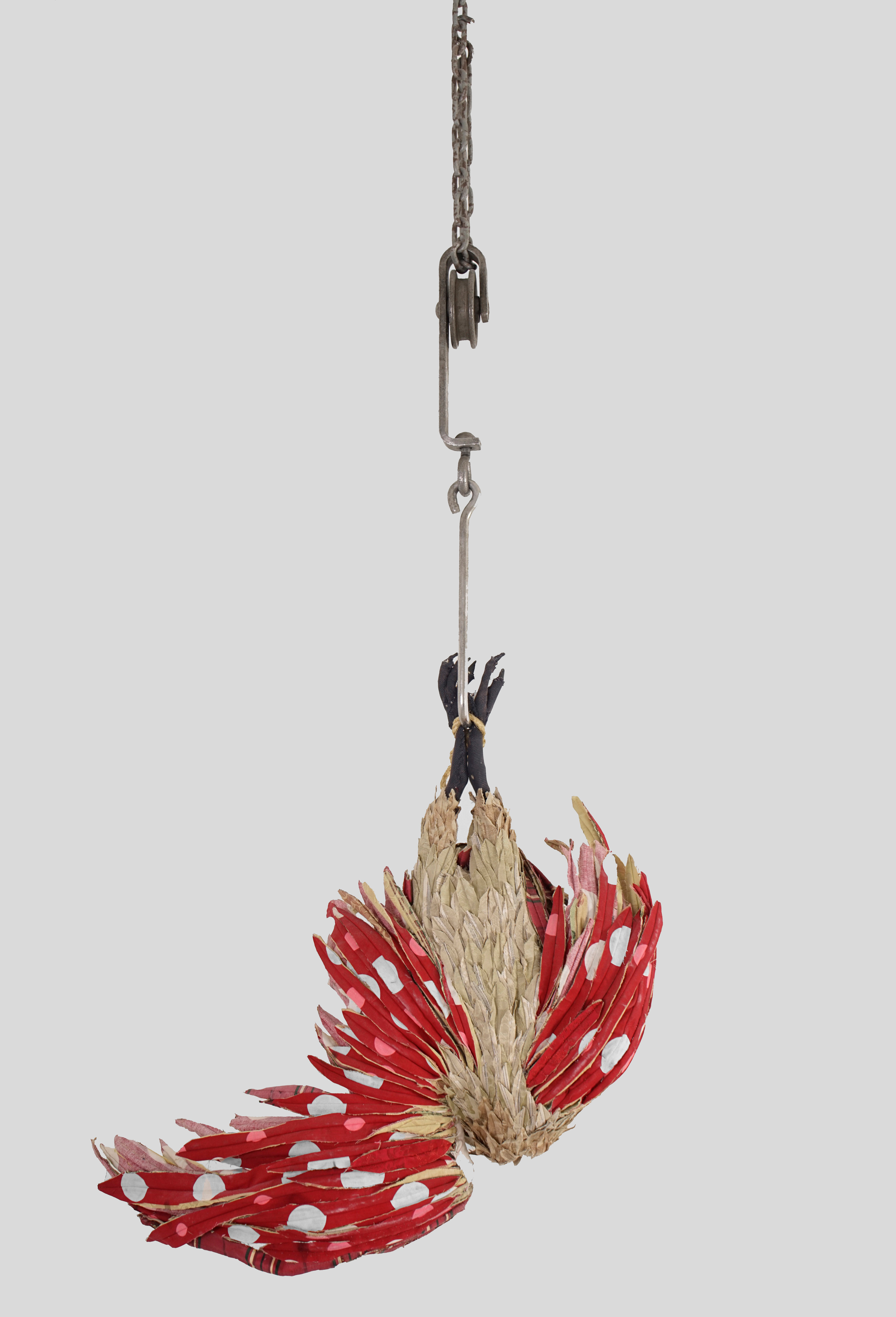 "Apotropaic" 2015 (Back) | Discarded clothing, discarded upholstery fabric, meat hooks, chain | 33 x 34 x 18 in.