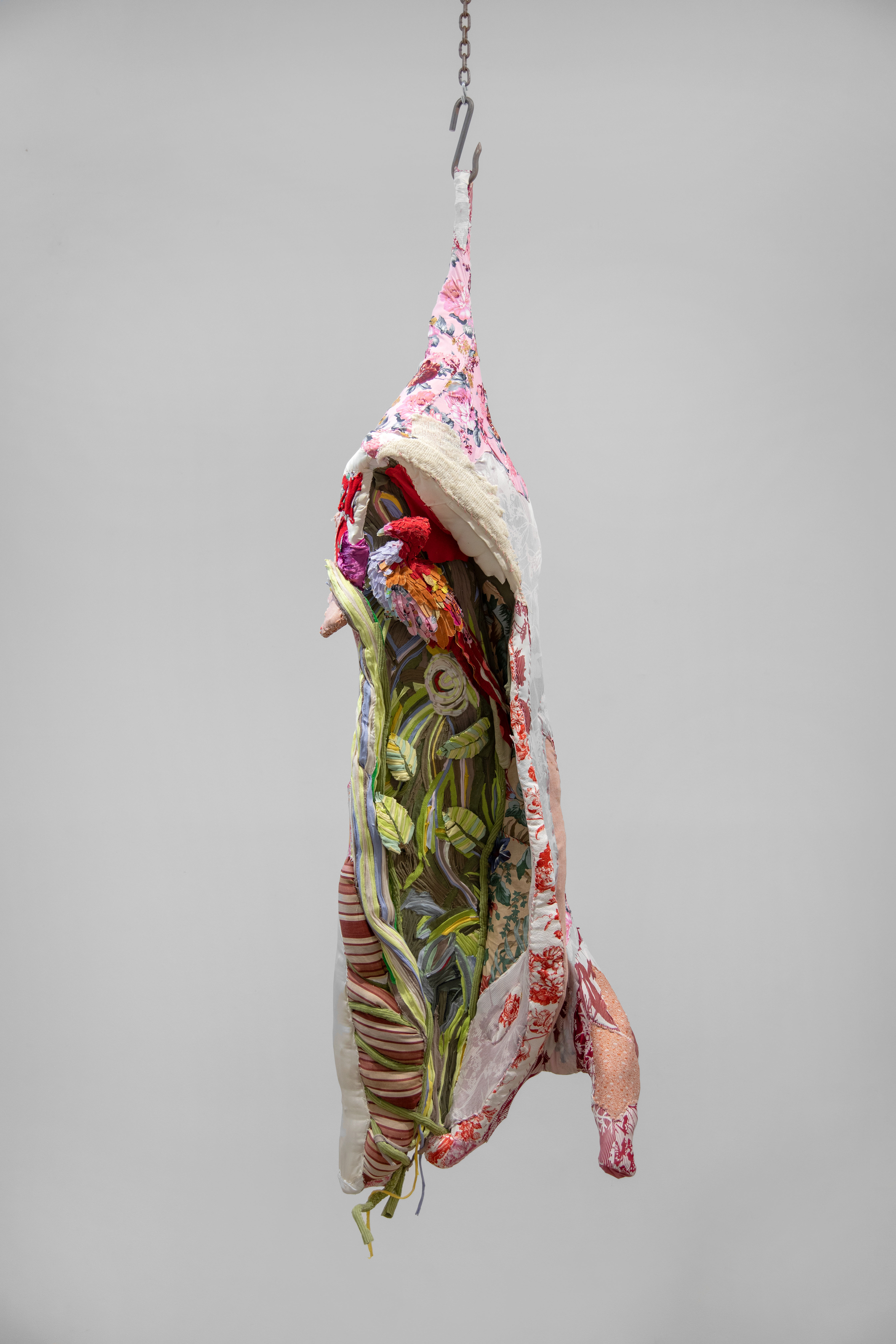 "Tropical Rococo" 2023 | Discarded textiles | 90 x 32 x 15 in.
