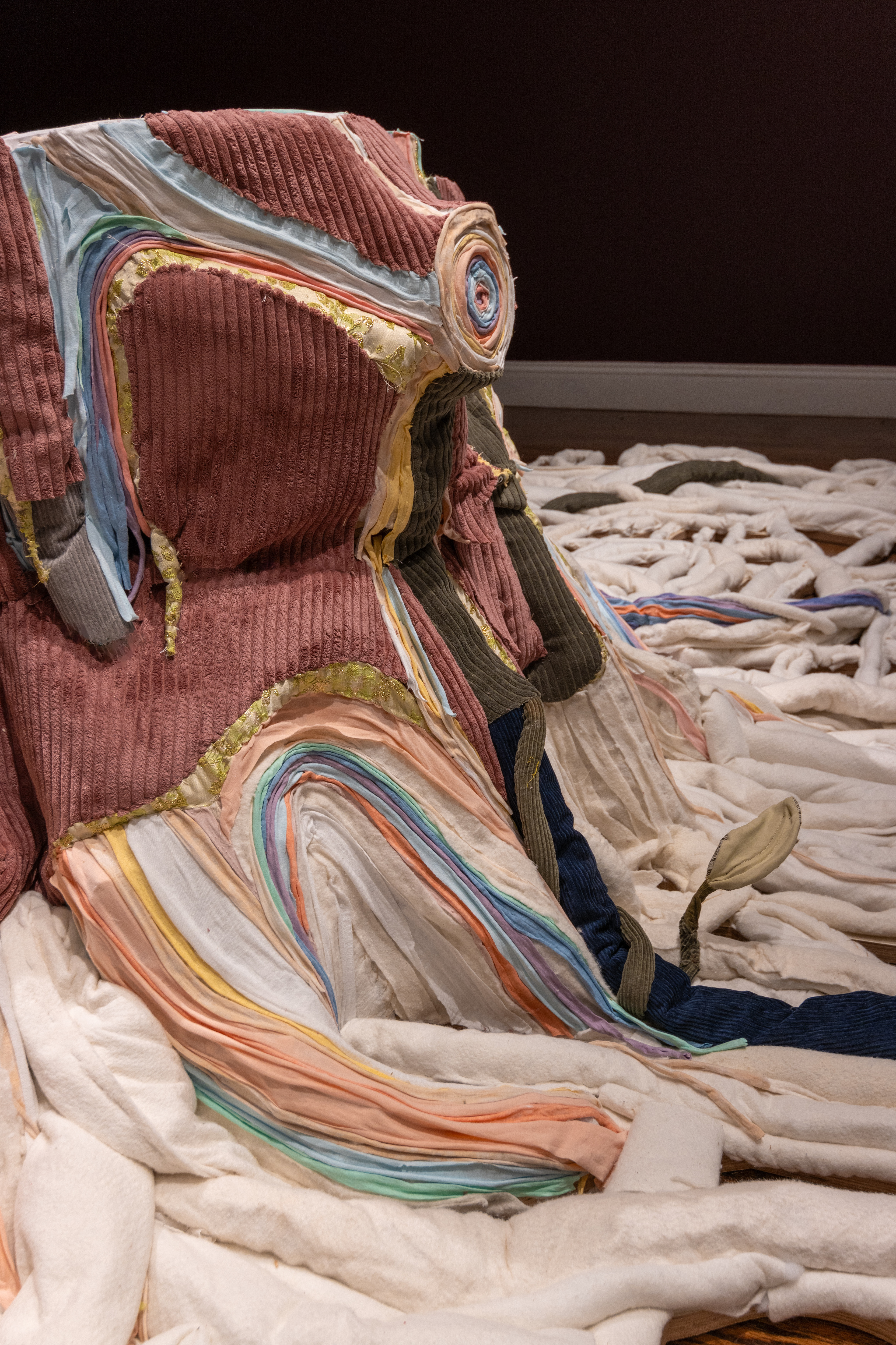 "Narcissus" 2025 (Detail) | Discarded textiles, wood | 20 x 16 x 3.5 ft.
