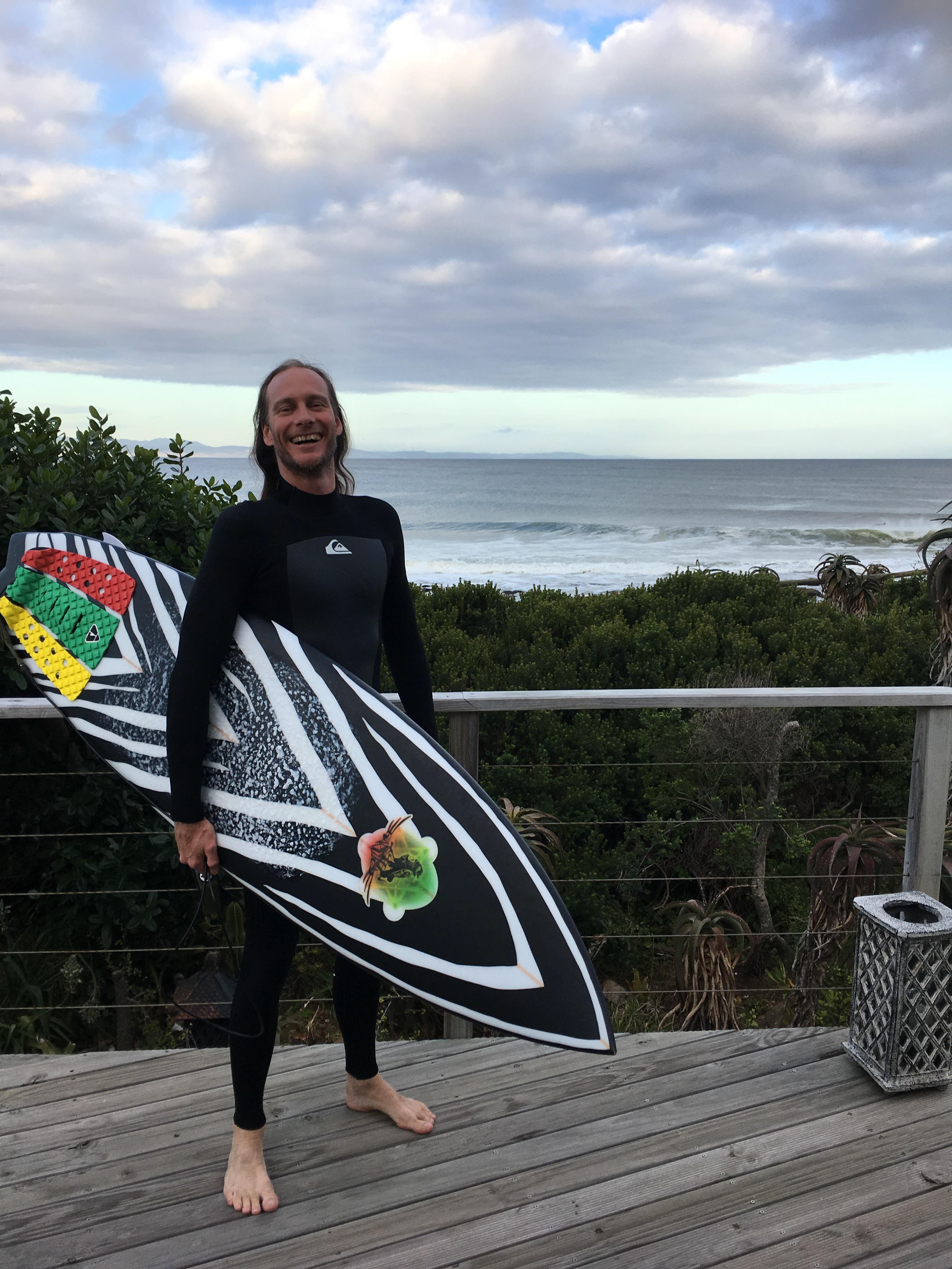 Daz Collins about to ride the surfboard at the famous Supertubes, Jeffreys Bay, South Africa