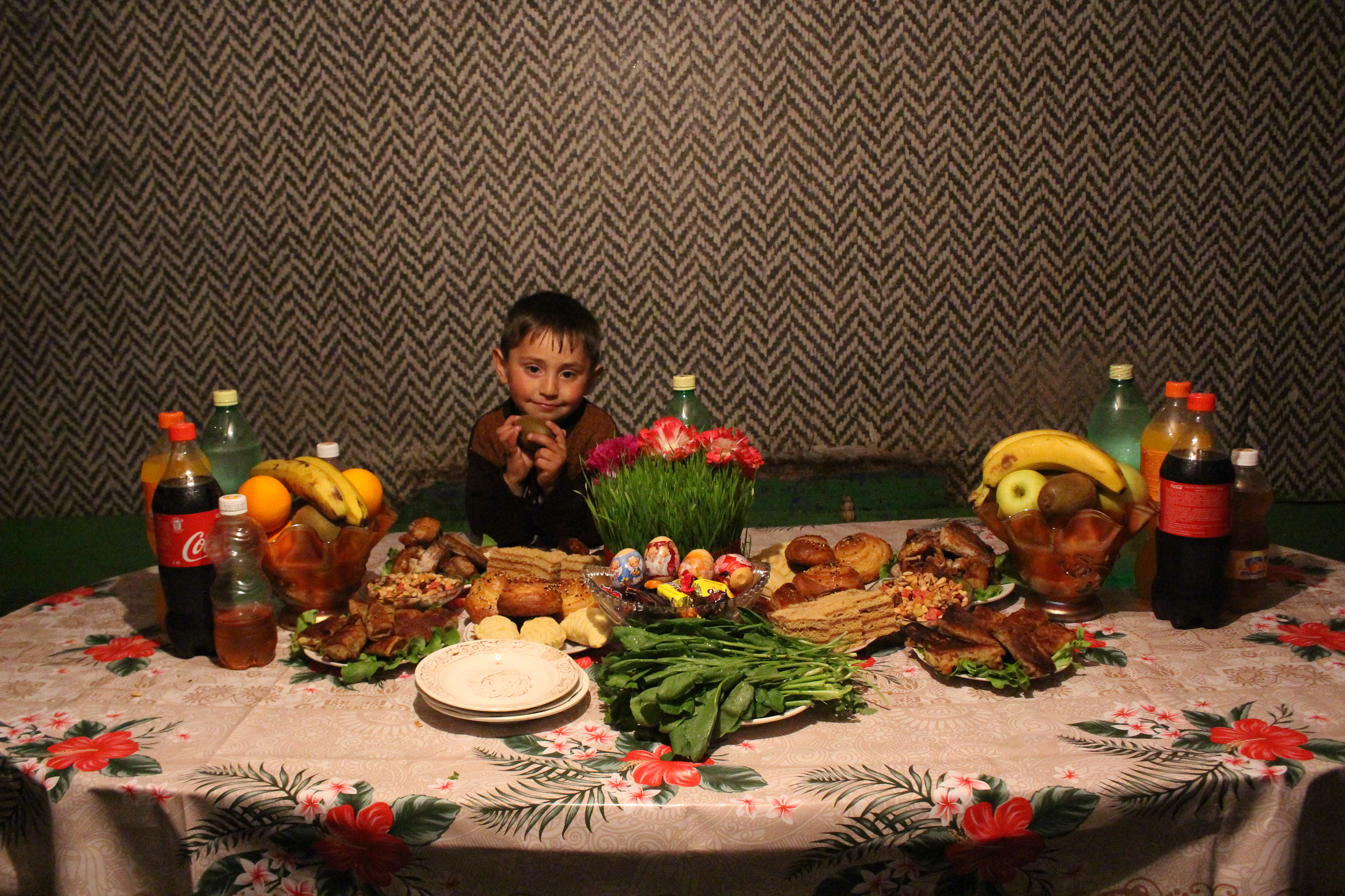Muraz, Yetar's youngest grandson, waiting to enjoy the feast of Novruz Bayrami.