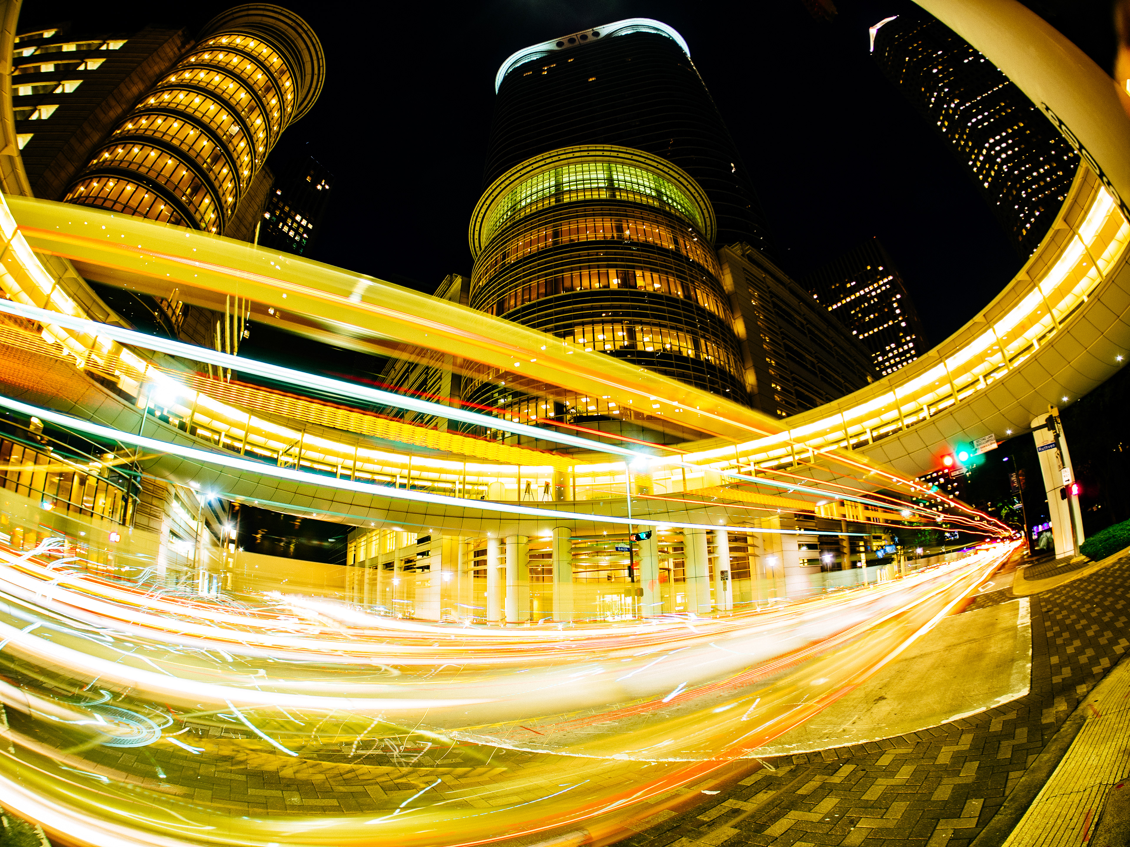 A long exposure at the Chevron Building in Houston, Texas, USA.  When you are photographing here they send out a guard and try to tell you that you can't photograph the building even tho you are standing on public poperty aka the sidewalk.