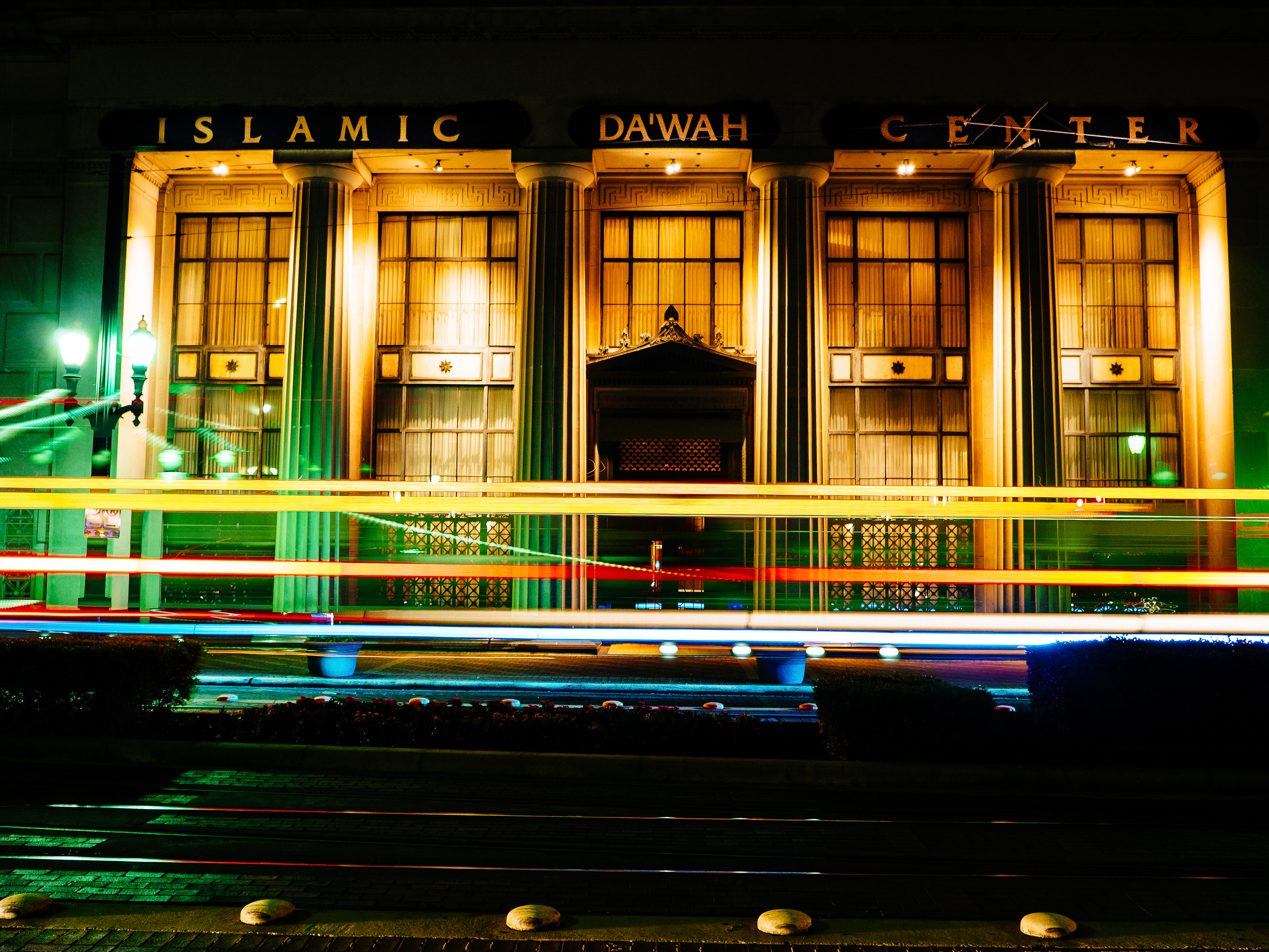 A long exposure of the trolley passing the Islamic Da'Wah Center in Houston, Texas, USA.