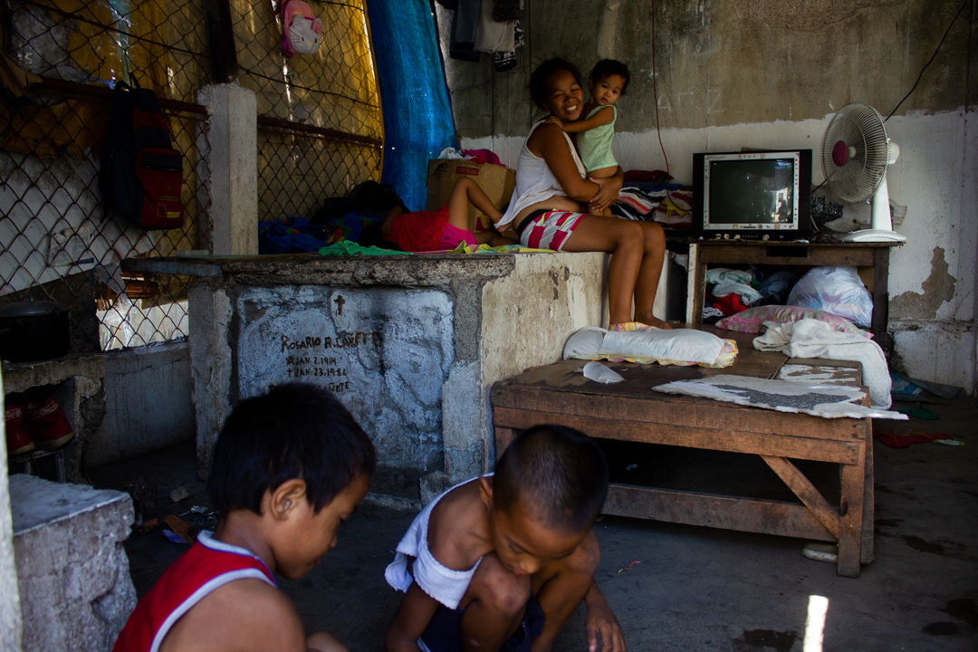 Many families live amongst the dead in crypts. Carreta, Cebu, Philippines.