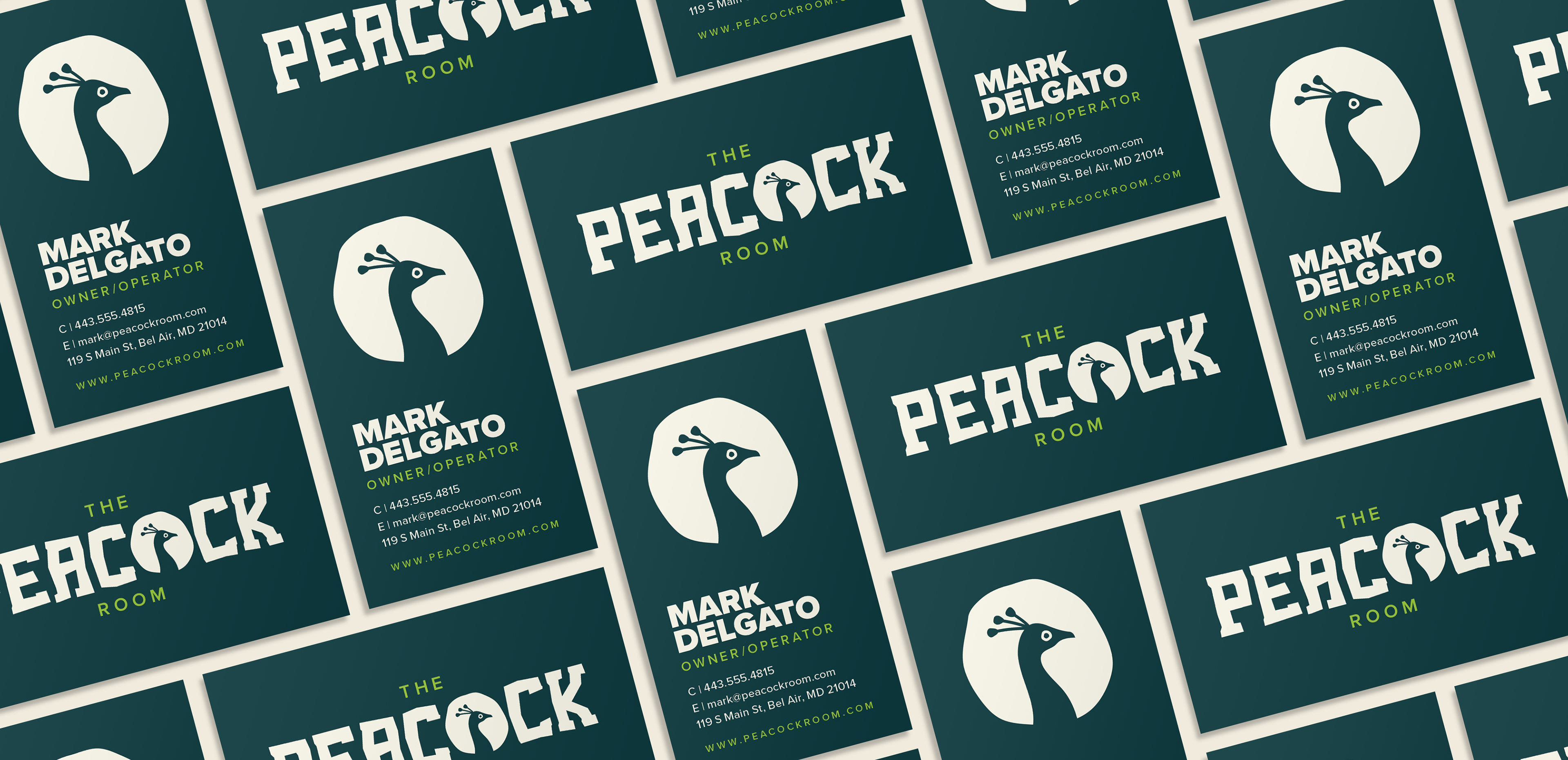 Structured layout of business cards designed for The Peacock Room, showcasing bold typography and maximalist branding by Tyler Zent.