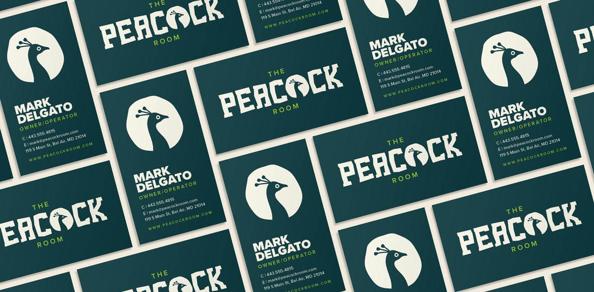 Structured layout of business cards designed for The Peacock Room, showcasing bold typography and maximalist branding by Tyler Zent.