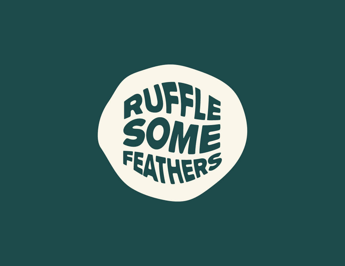 Slogan badge for The Peacock Room featuring the tagline ‘Ruffle Some Feathers,’ designed by Tyler Zent to capture the lounge’s bold and playful spirit.