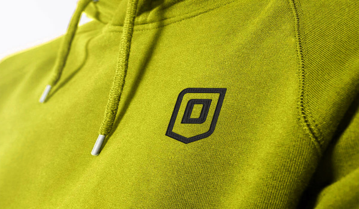 Close-up of Onguard Protective Workwear hoodie showing embroidered brand mark and high-quality construction details as part of the brand rebrand.