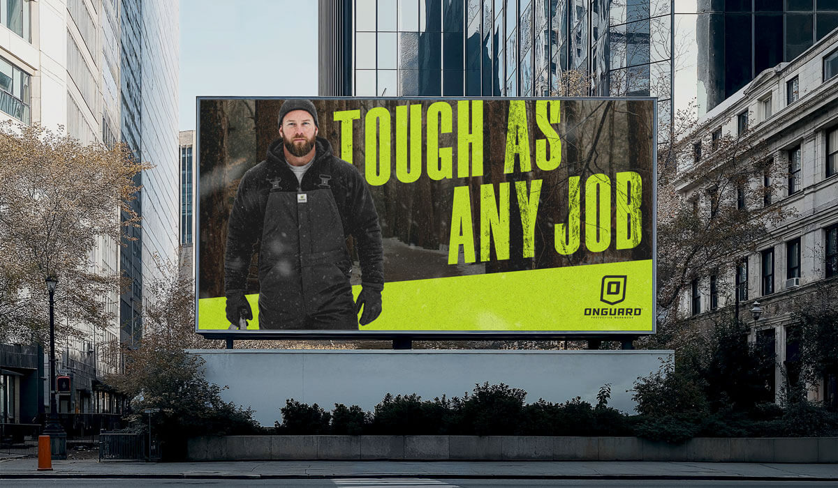 Outdoor billboard advertising campaign for Onguard Protective Workwear featuring the “Tough As Any Job” launch message and brand identity.