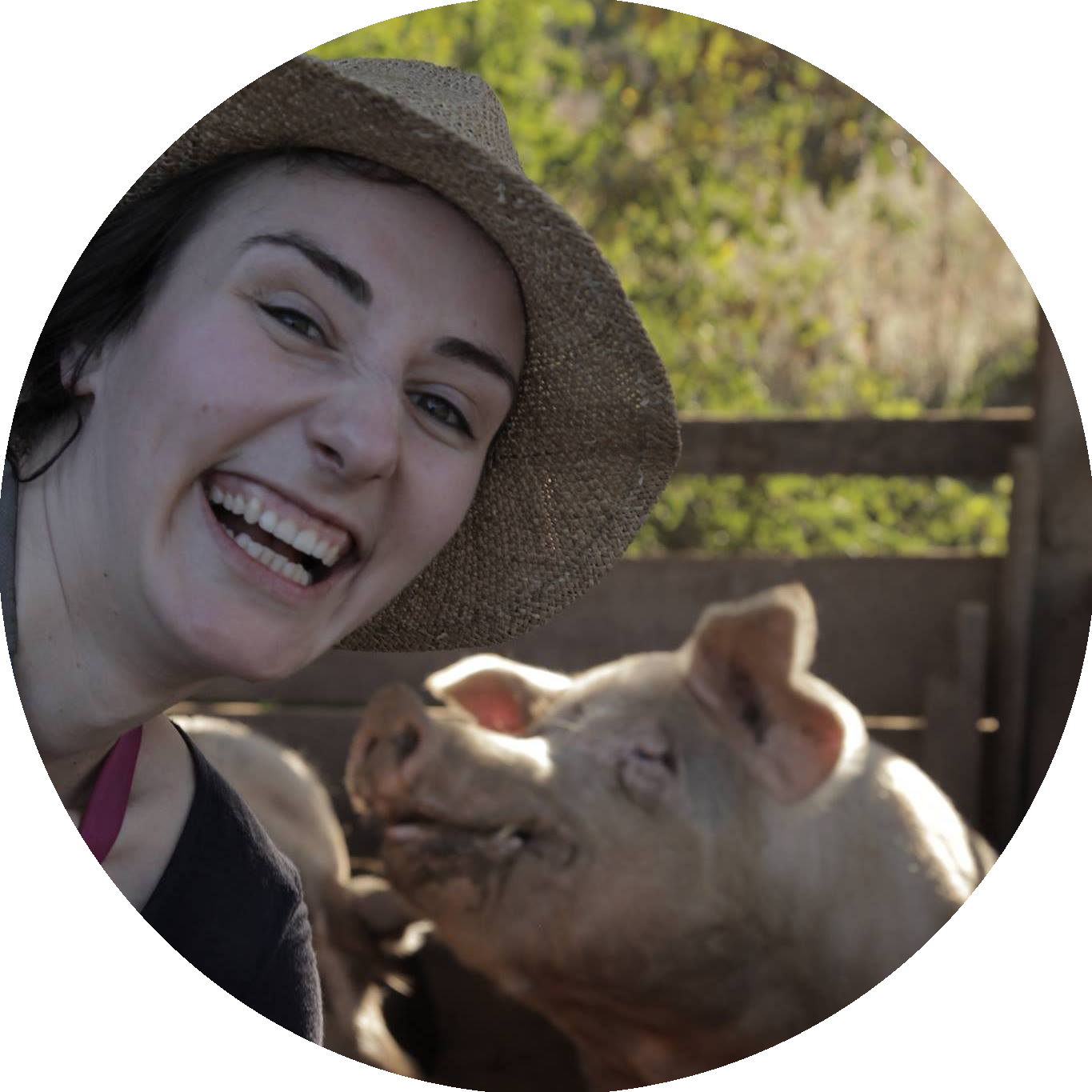 Paulina Ziolkowska with a pig