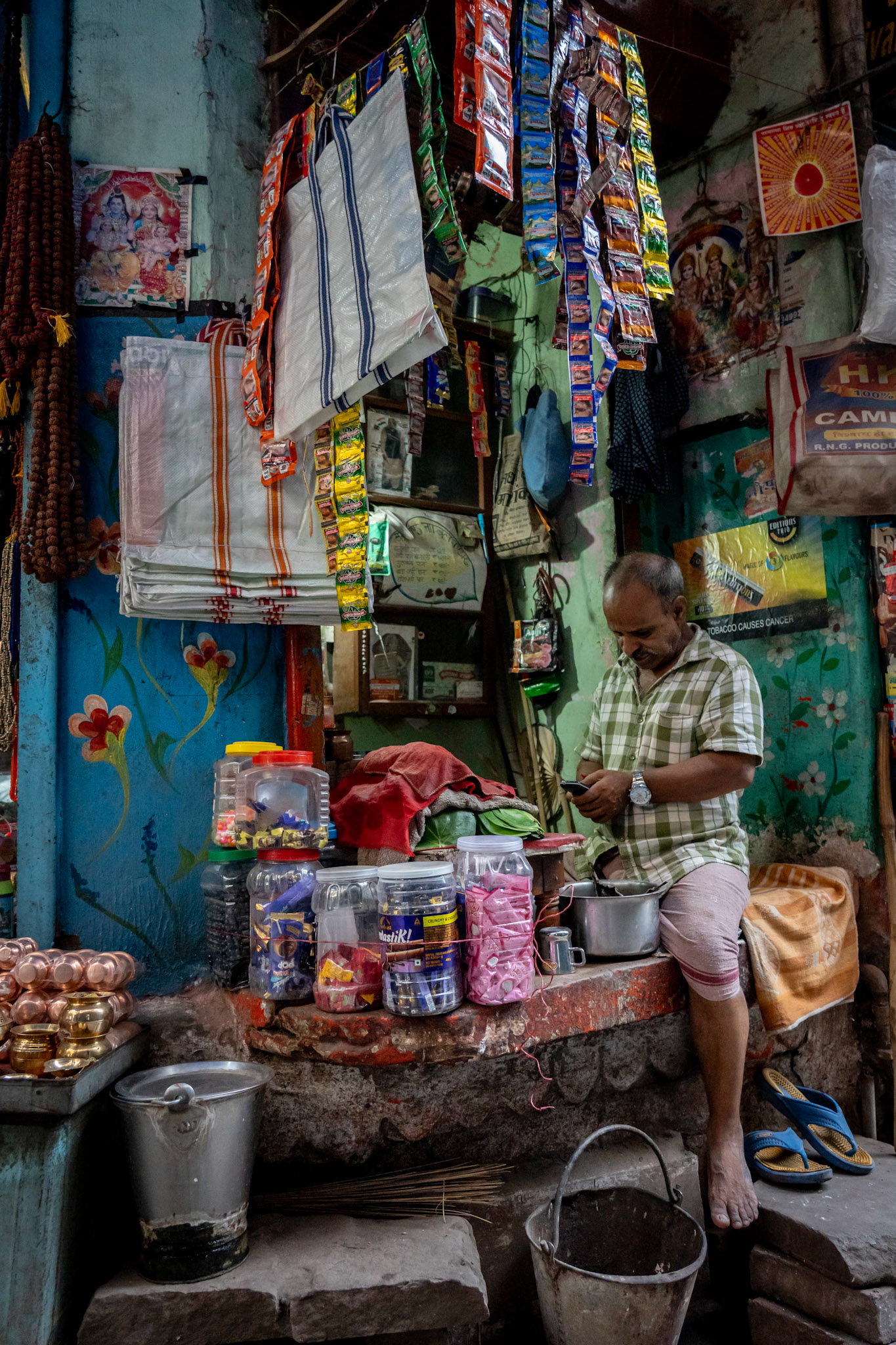 Shop owner making paan in Varanasi