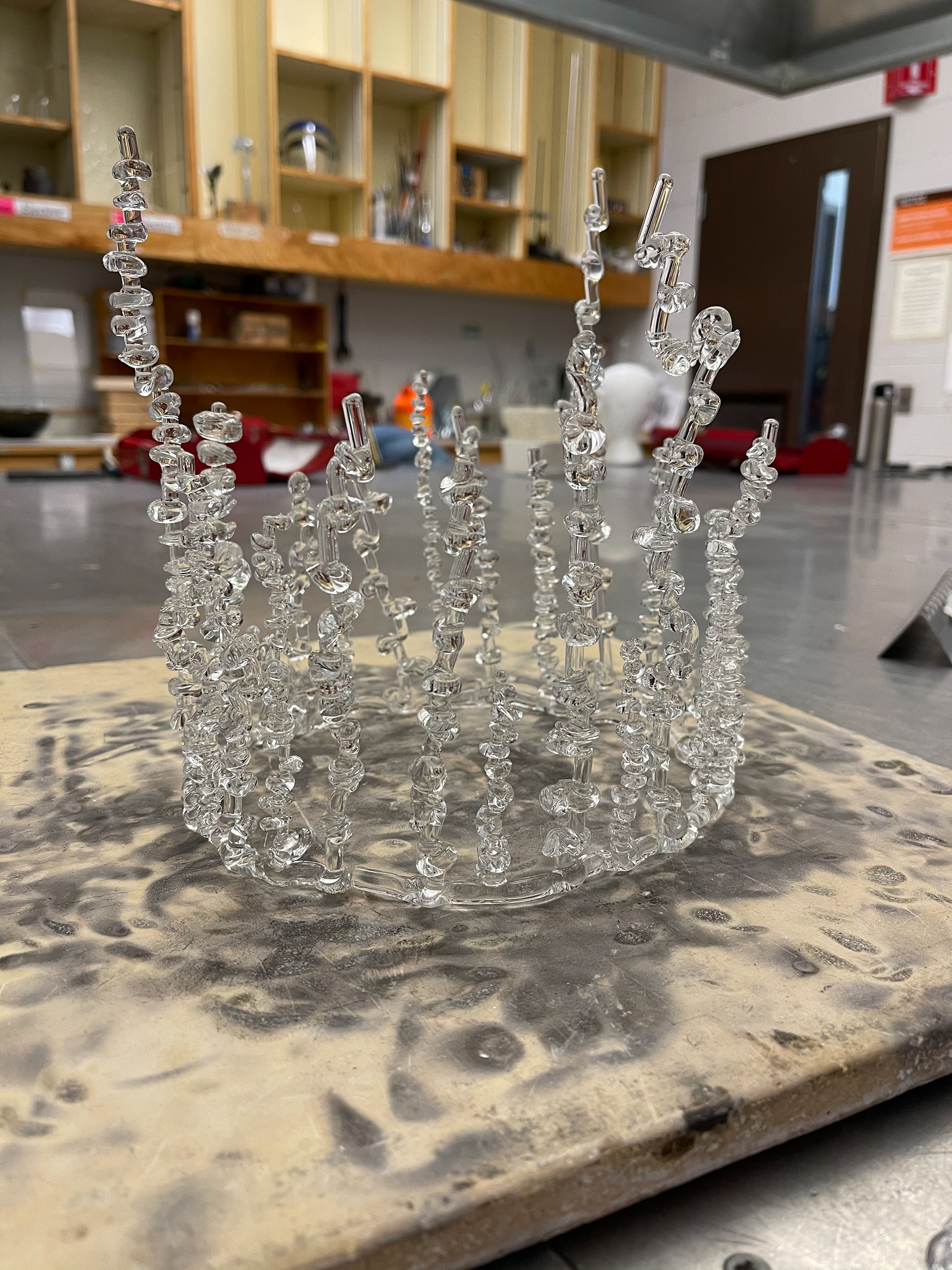 Flame-worked glass crown.