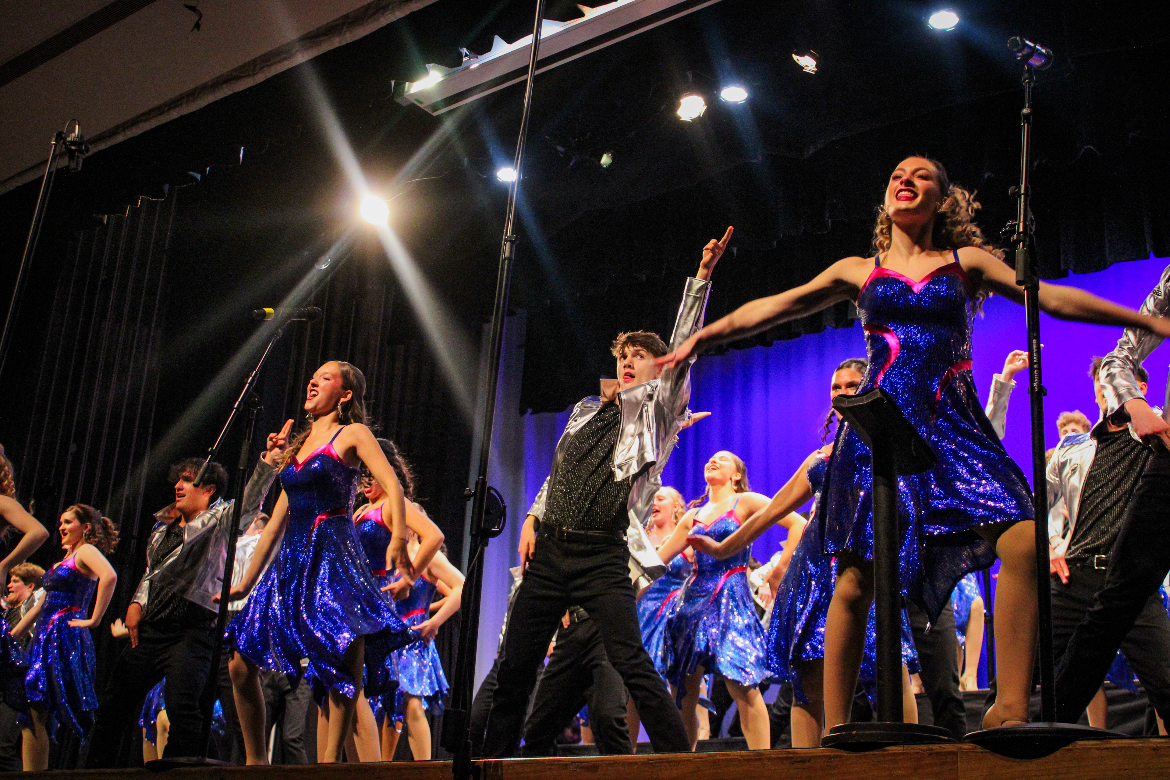 Junior Nick Day dances during the finale song of ATSC's show, "Moving Forward".